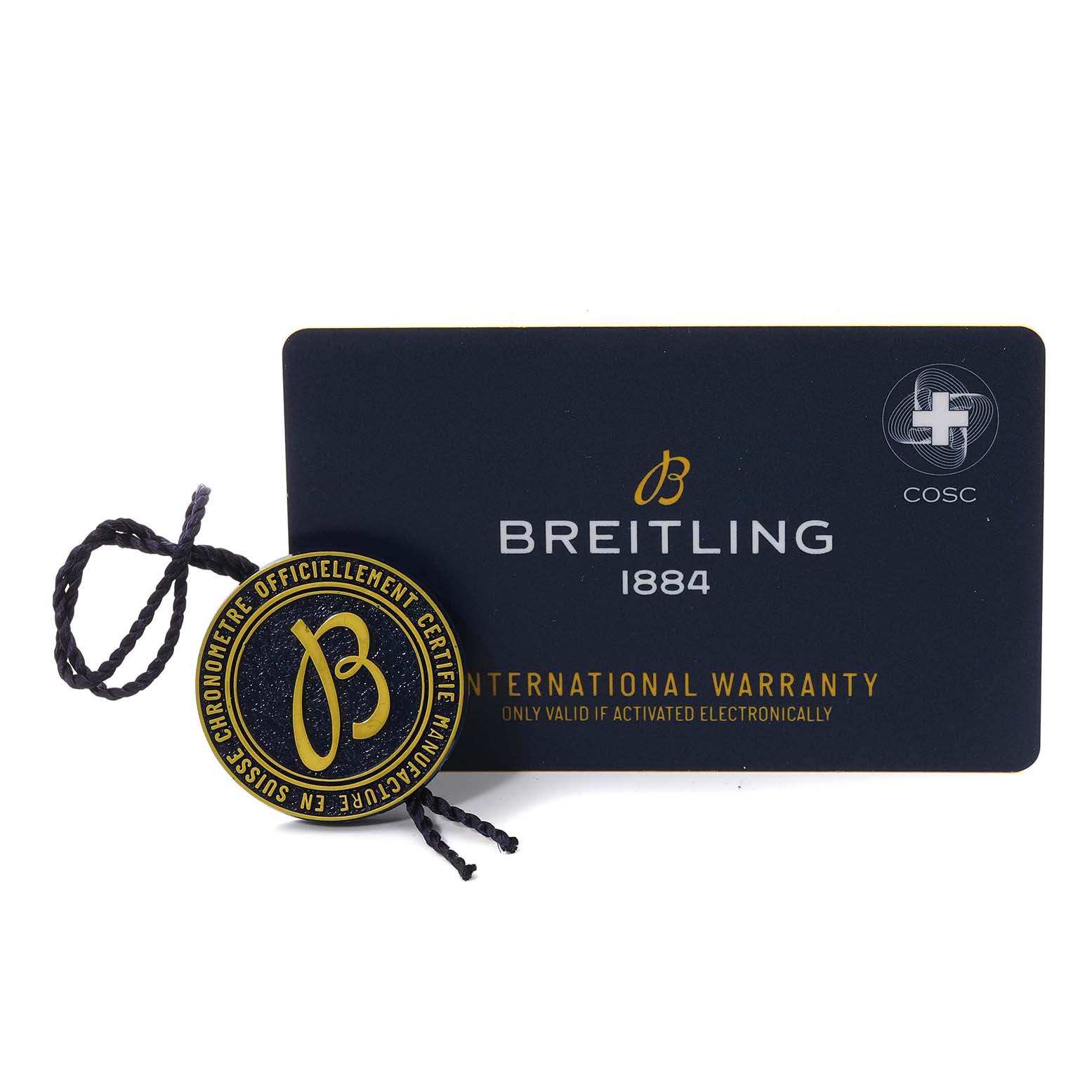 The image shows the Breitling Superocean A17367D Men's Stainless Steel Blue Dial A17367D Men's Stainless Steel Blue Dial model's international warranty card and a black and gold certification tag.