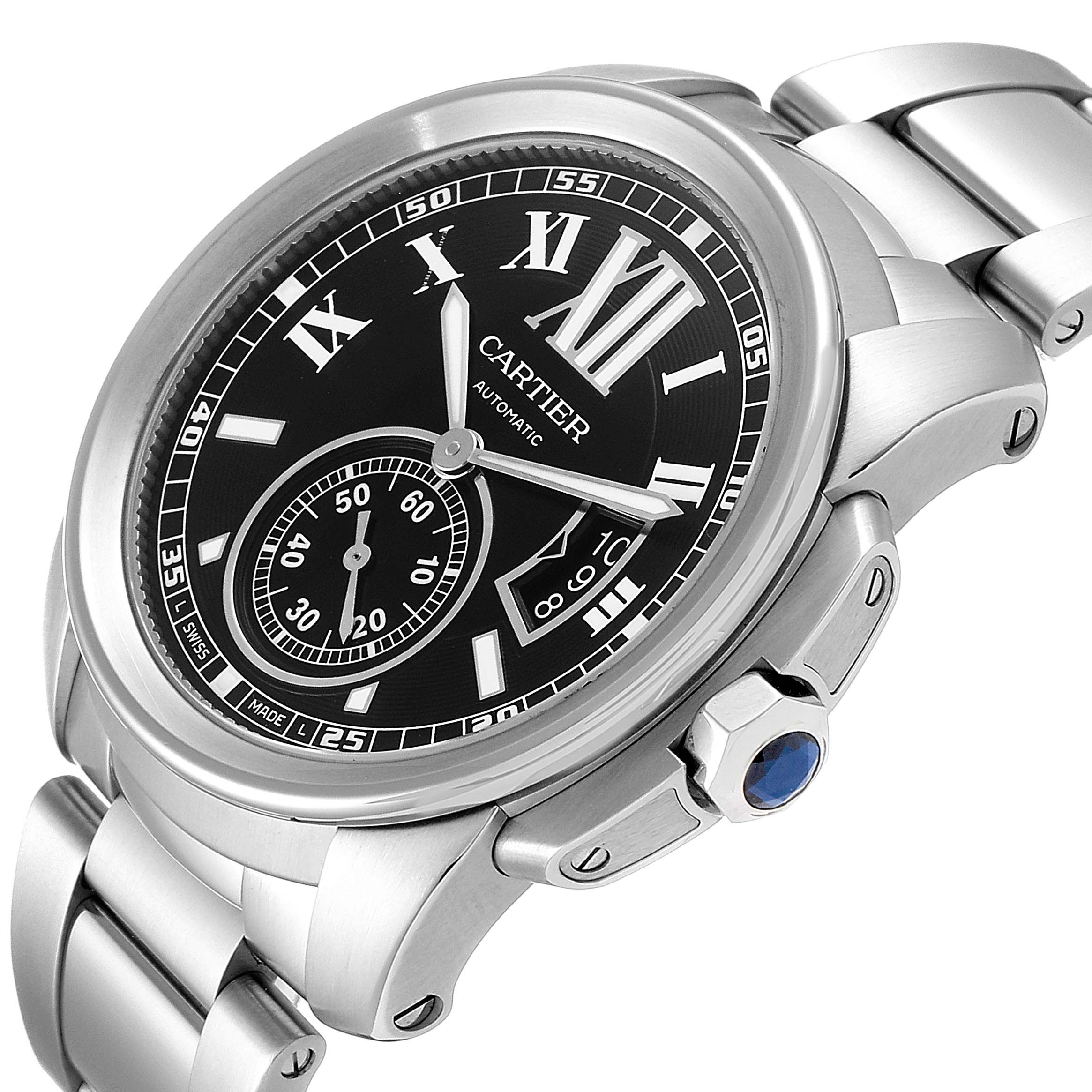 The image shows a close-up angled view of the Calibre de Cartier watch by Cartier, highlighting the dial, bezel, and bracelet.