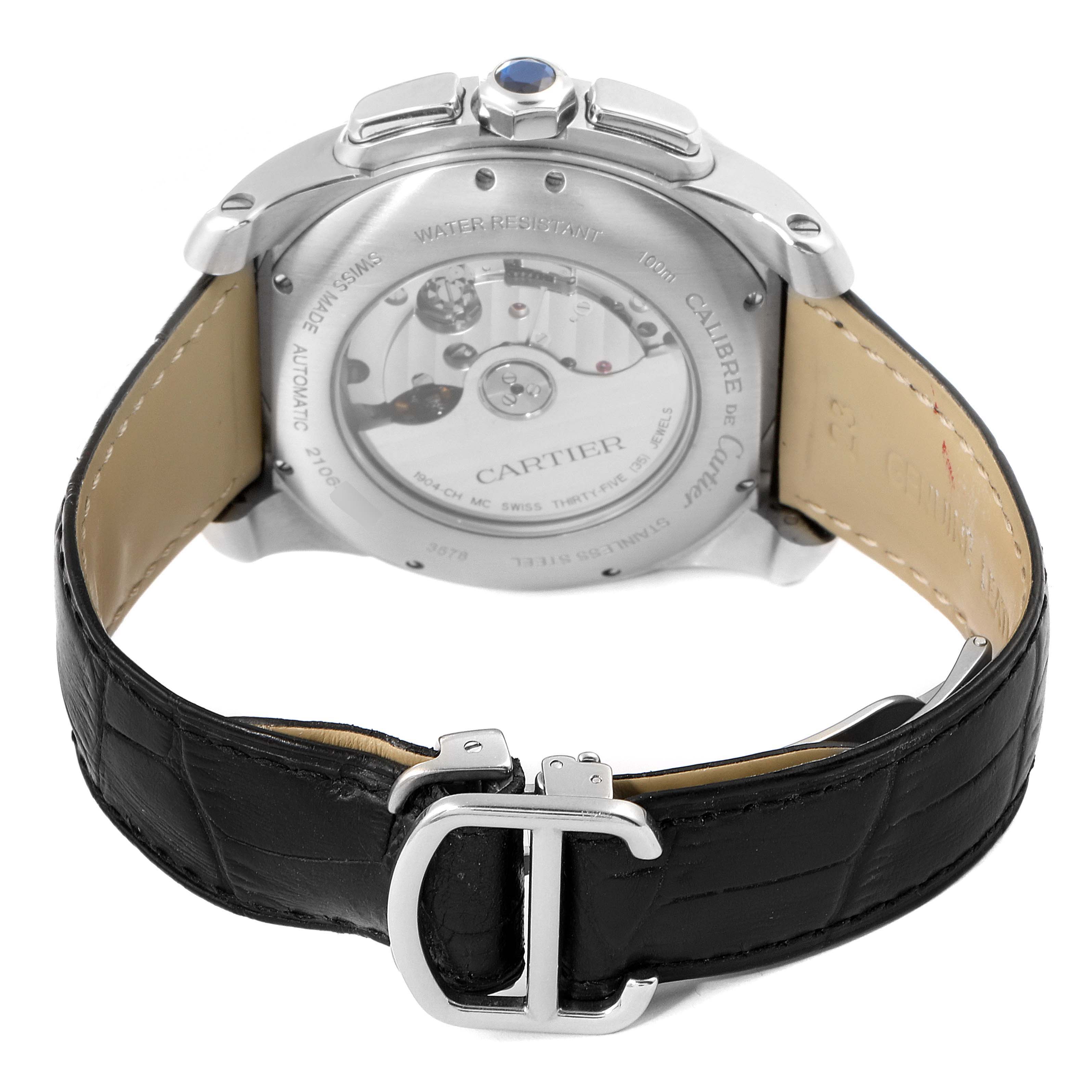 The image shows the back view of a Calibre de Cartier watch by Cartier, highlighting its leather strap and mechanical movement.