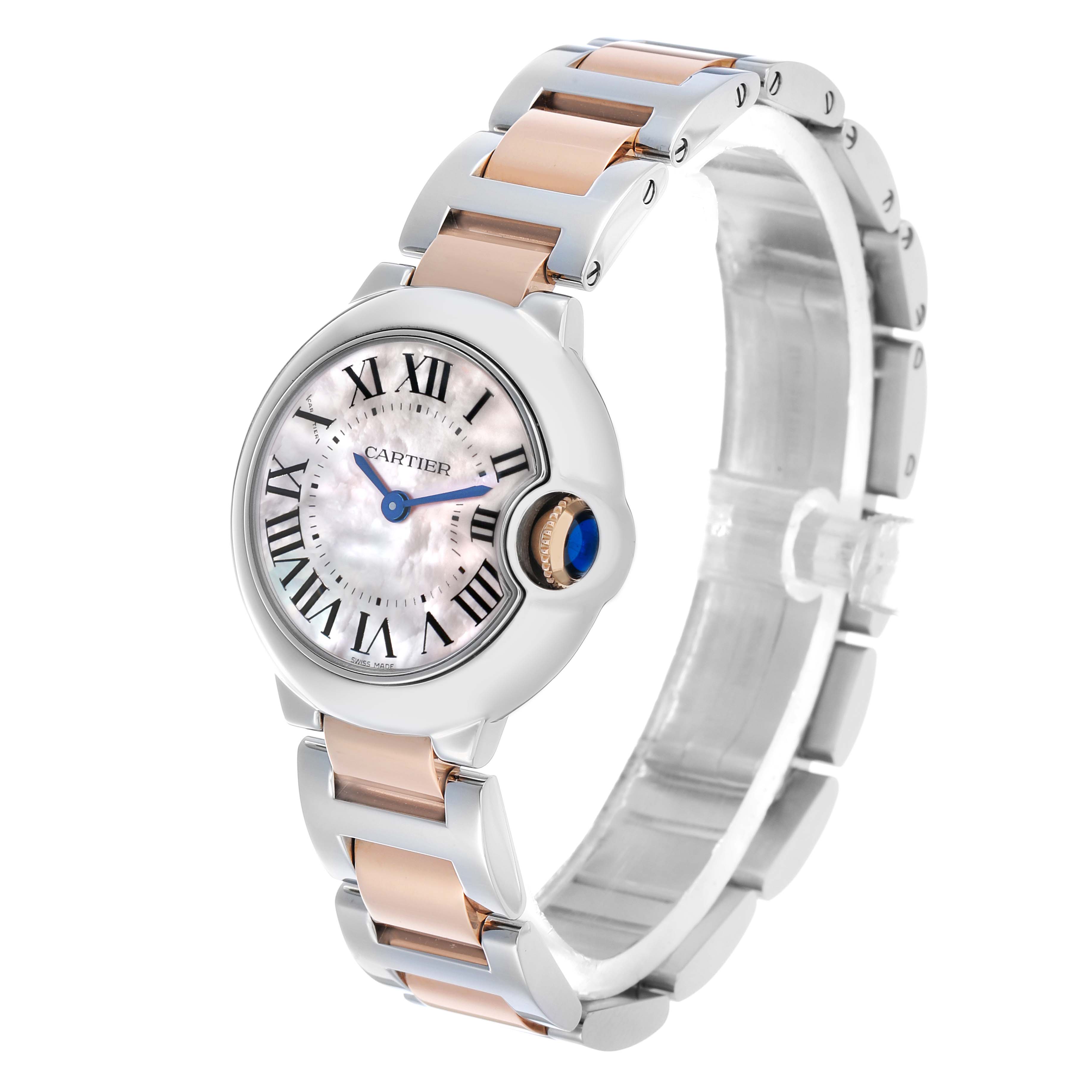 The Cartier Ballon Bleu W6920034 Women's Steel and Gold (two tone) Mother of Pearl Dial watch is shown from a three-quarter angle, highlighting the face, crown, and bracelet.