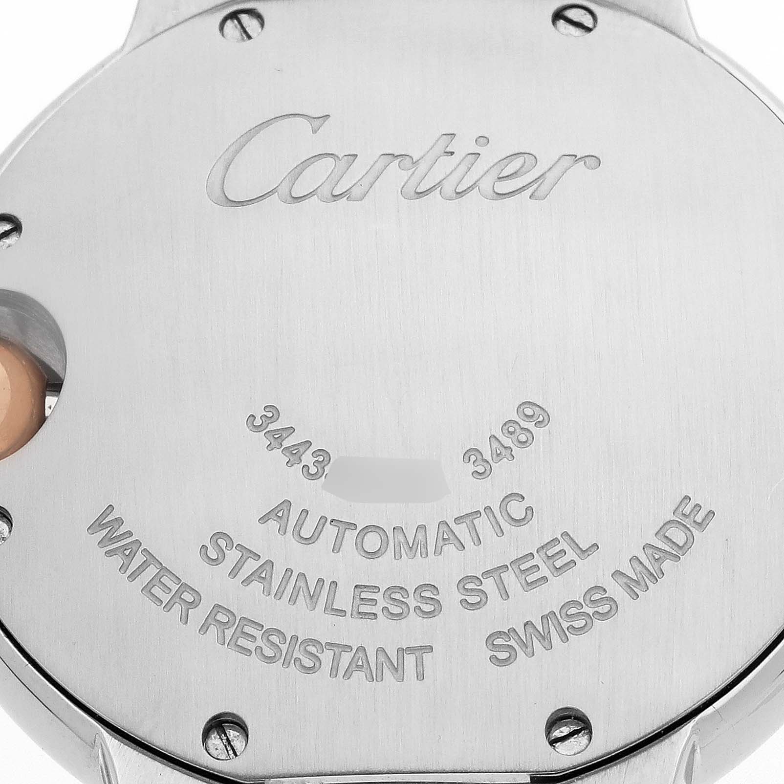 The image shows the back of a Cartier Ballon Bleu W6920070 Women's Steel and Gold (two tone) Mother of Pearl Dial watch, highlighting its engravings and stainless steel casing.