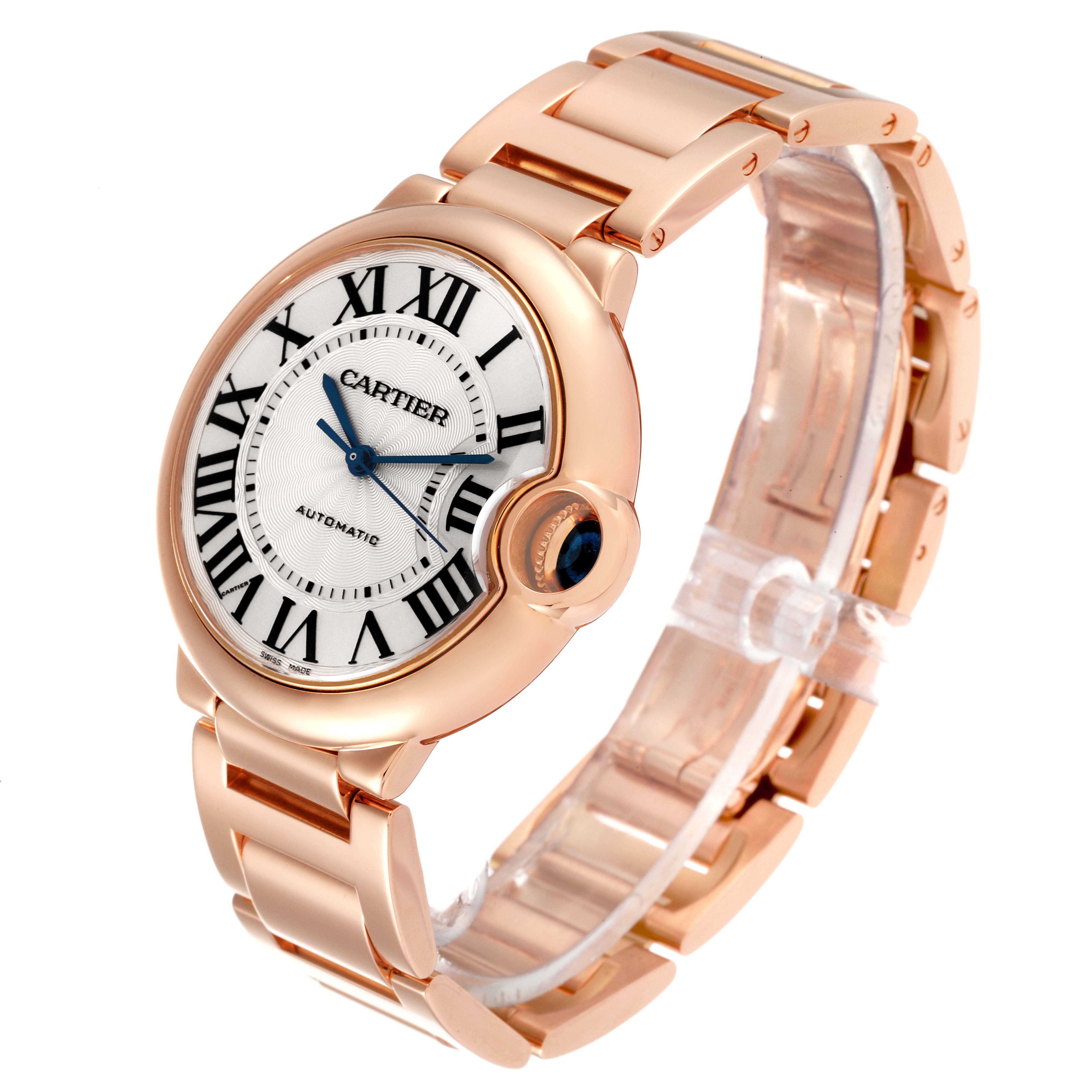The Cartier Ballon Bleu W69004Z2 Men's Rose Gold Silver Dial W69004Z2 Men's Rose Gold Silver Dial watch is shown at a three-quarter angle, displaying its round face, Roman numeral dial, and metal bracelet.