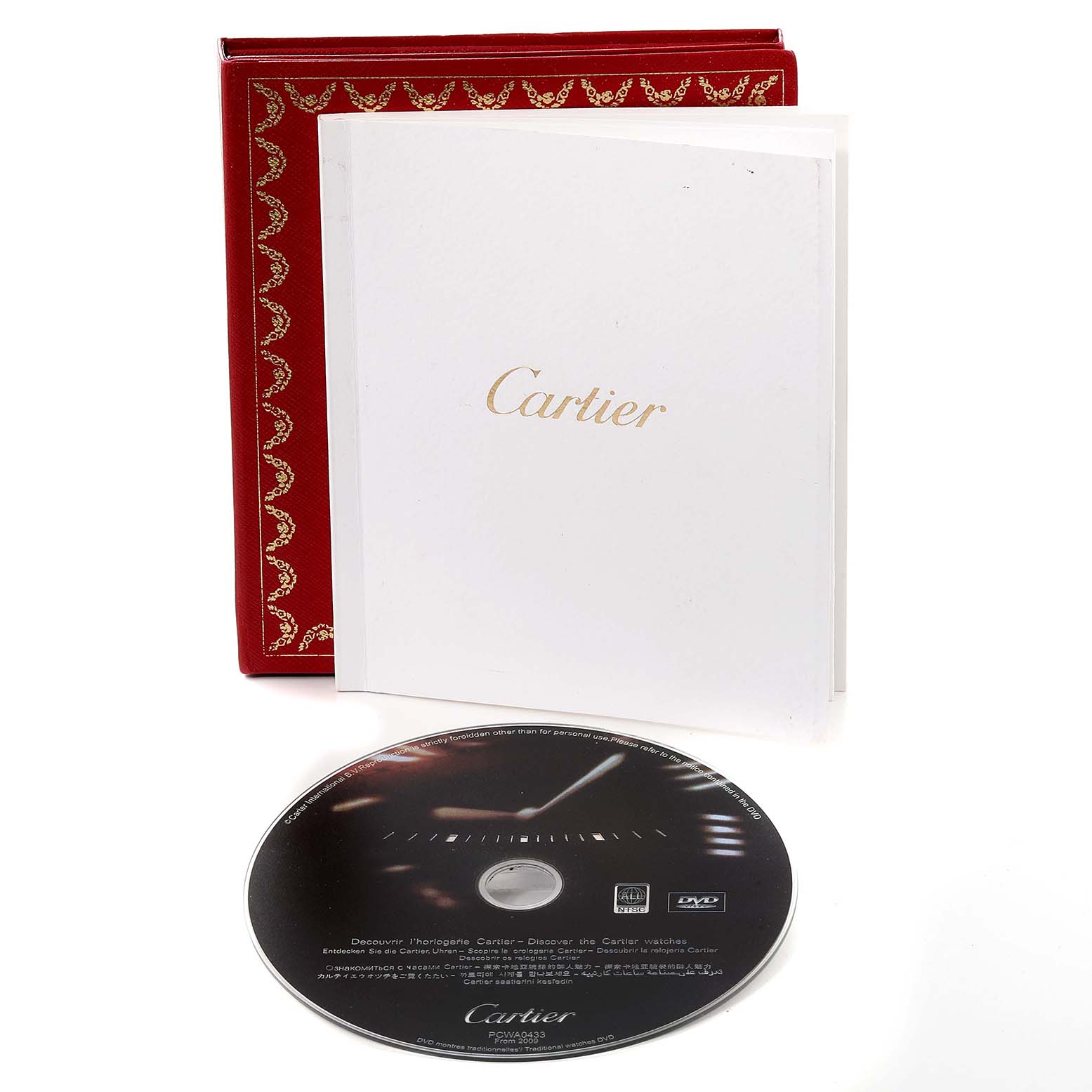 The image shows the packaging, a booklet, and a DVD for a Cartier Ballon Bleu WE902034 Women's Rose Gold Silver Dial WE902034 Women's Rose Gold Silver Dial model watch.