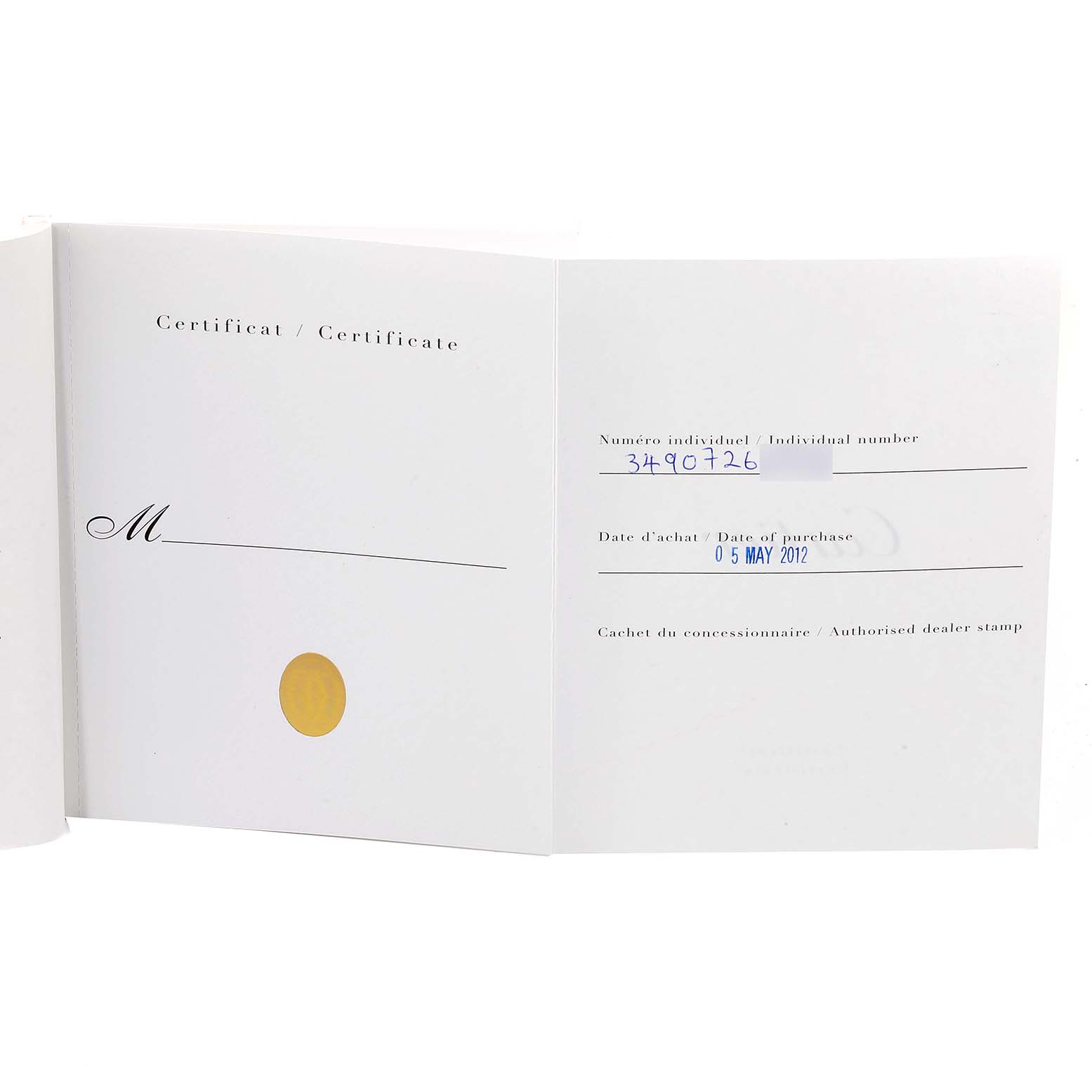 The image shows the open warranty certificate for a Ballon Bleu de Cartier watch.