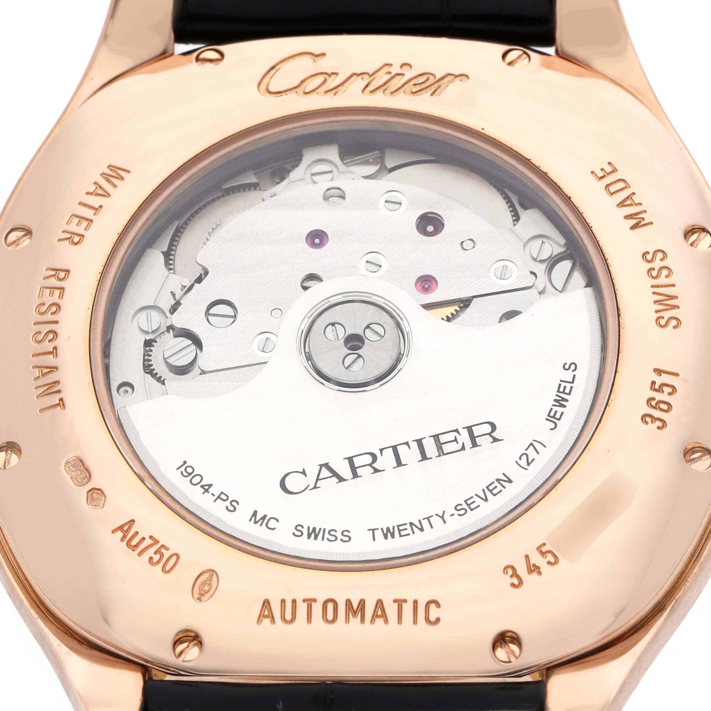 The image shows the back of the Drive de Cartier watch, displaying the movement through a transparent case back.