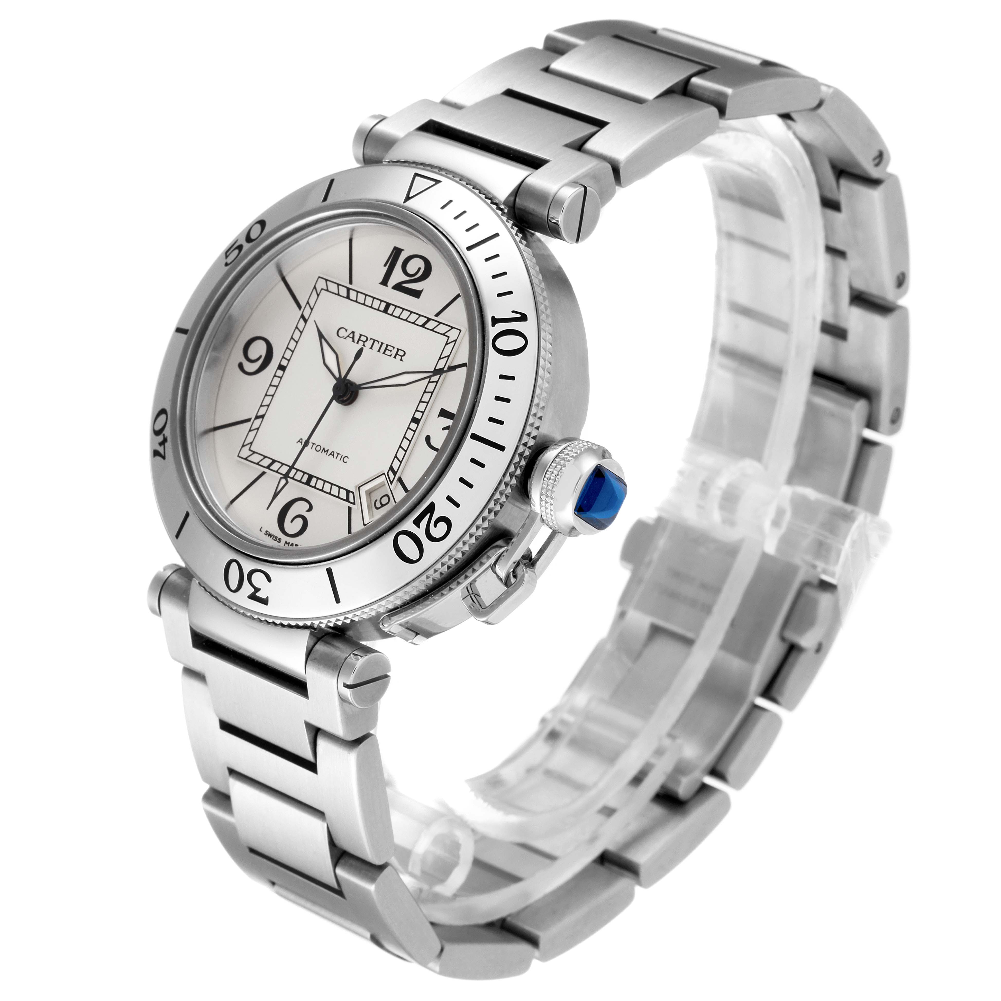 This image shows a Cartier Pasha W31080M7 Men's Stainless Steel Silver Dial W31080M7 Men's Stainless Steel Silver Dial watch from a three-quarter angle, highlighting the dial, bezel, bracelet, and crown.