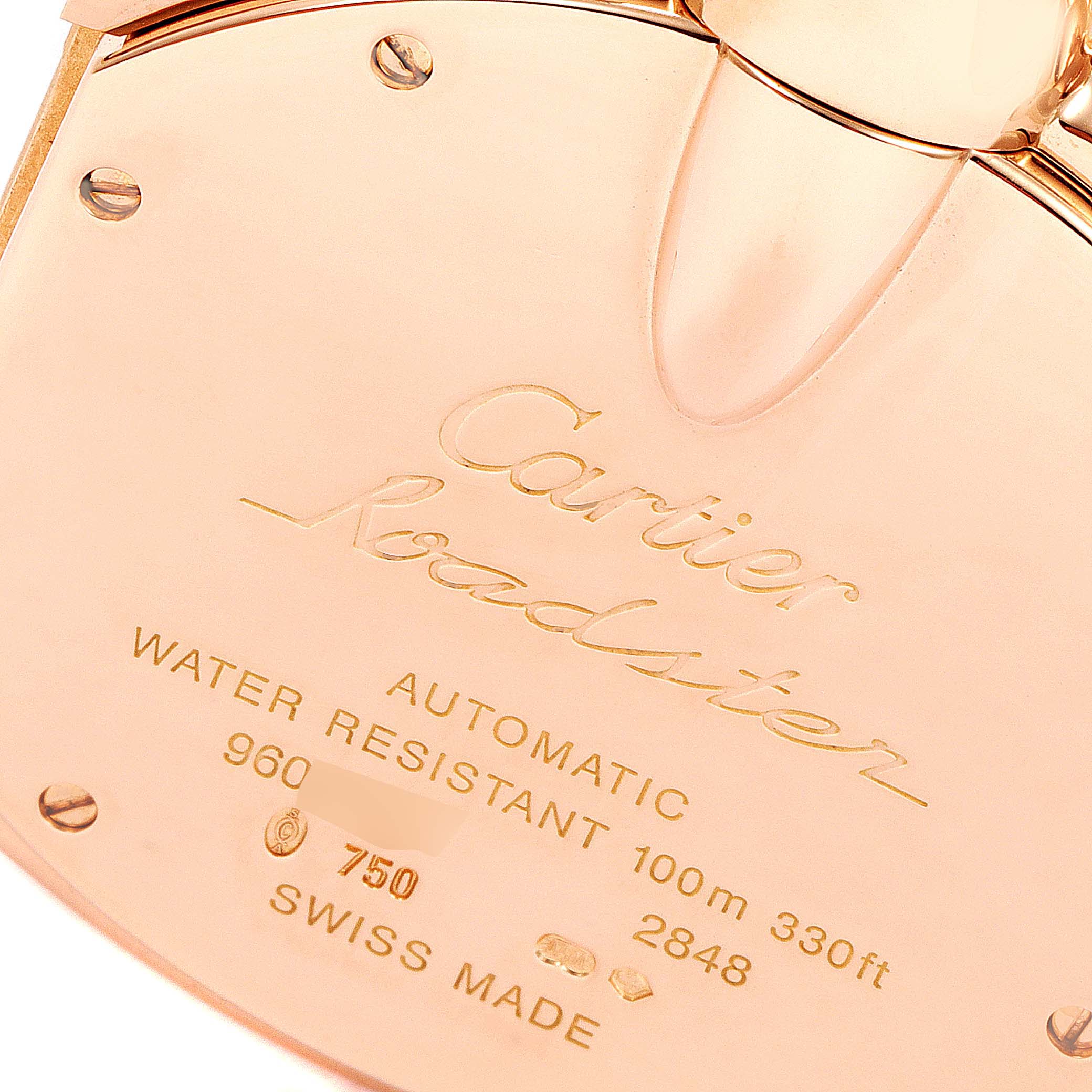 Close-up of the back case of the Cartier Roadster W62042Y5 Men's Rose Gold Brown Dial W62042Y5 Men's Rose Gold Brown Dial watch showing engravings and water resistance information.