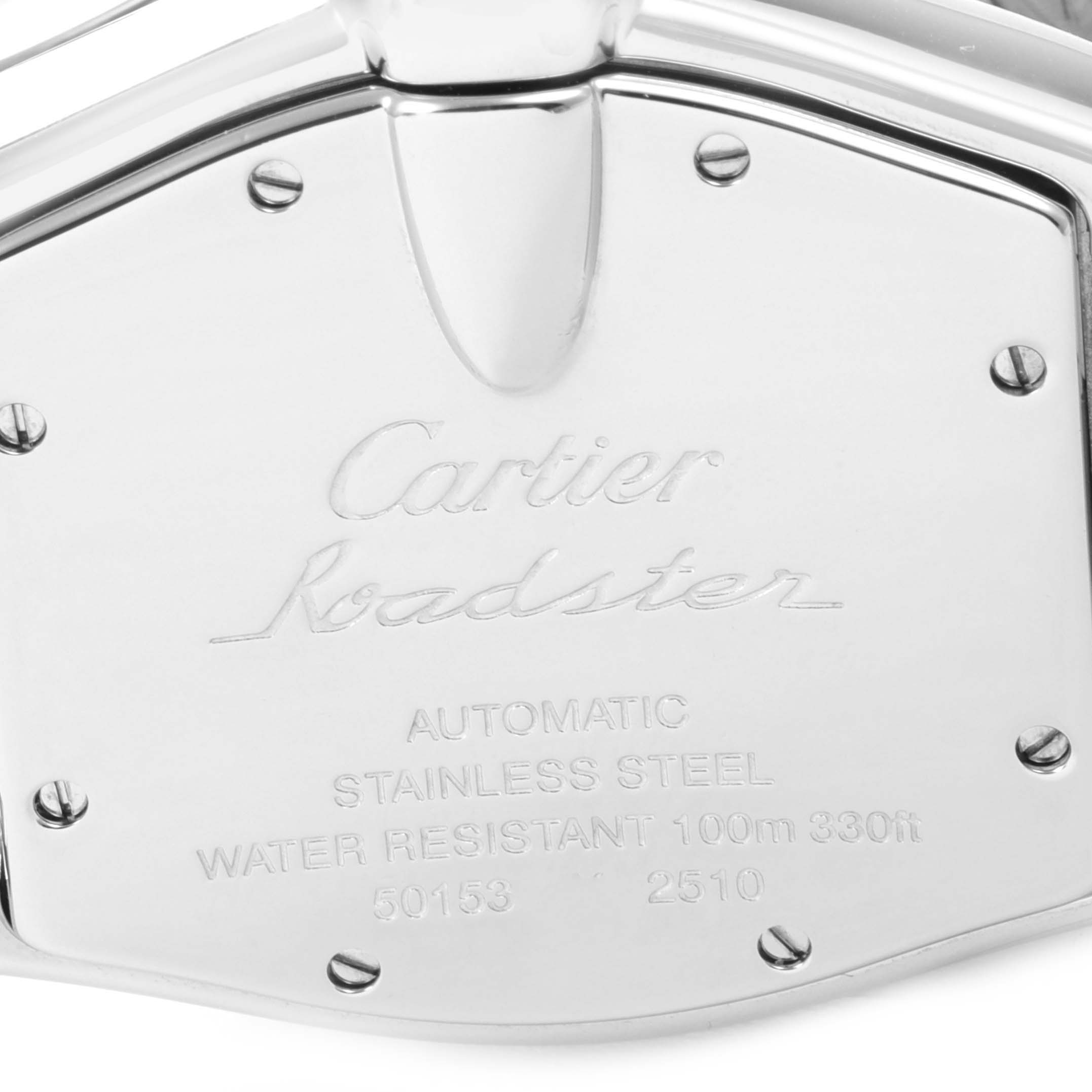 The image shows the back case of a Cartier Roadster W62025V3 Men's Stainless Steel Silver Dial W62025V3 Men's Stainless Steel Silver Dial watch, highlighting the engravings and screws.