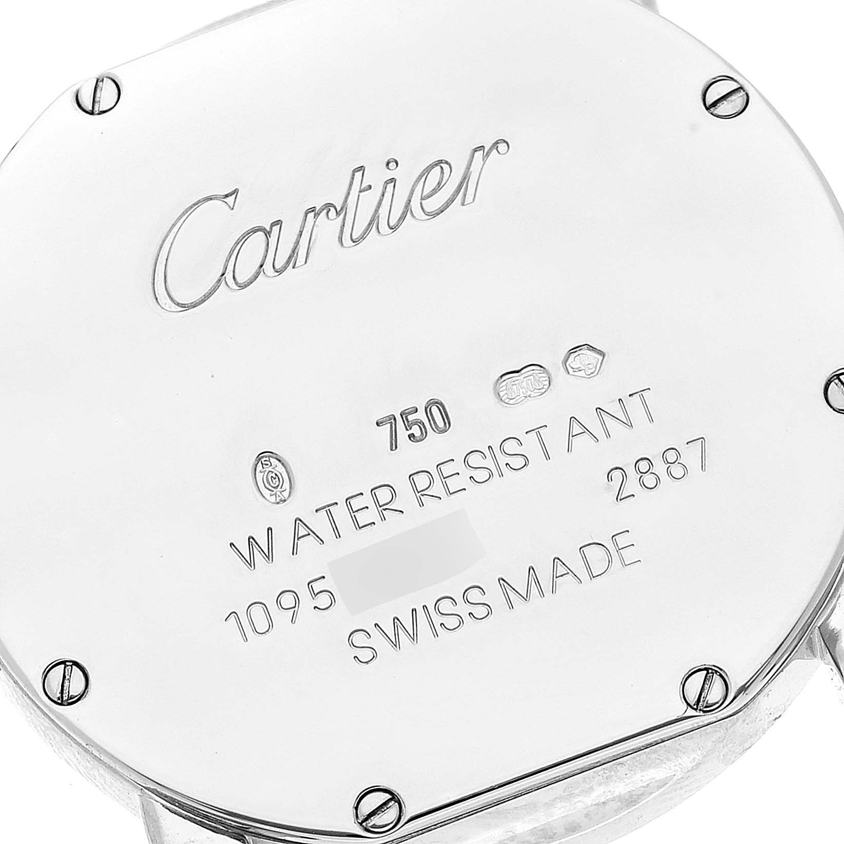 This image shows the back case of a Cartier Ronde WR000251 Women's White Gold Silver Dial WR000251 Women's White Gold Silver Dial watch with engraving and screws visible.