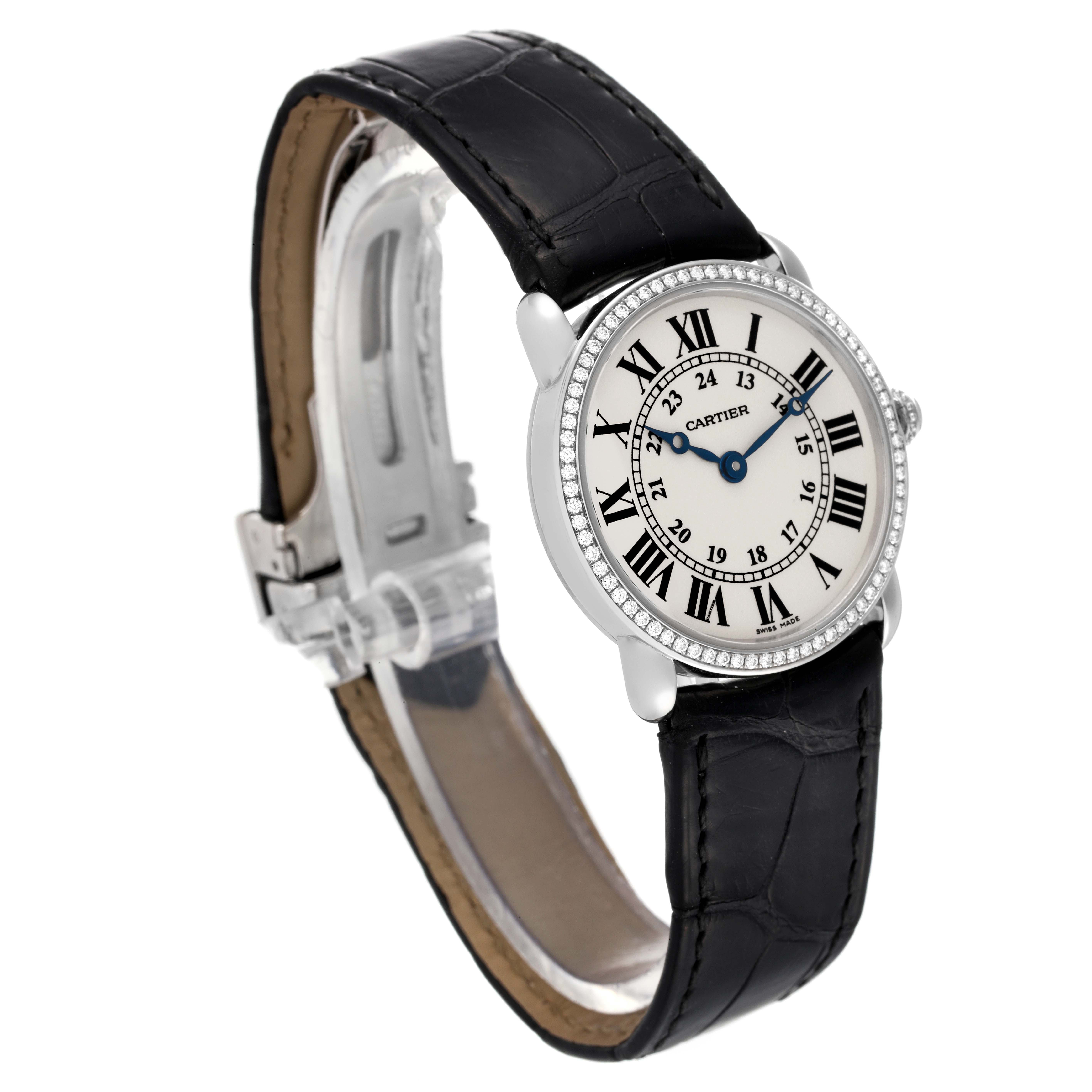 This Cartier Ronde WR000251 Women's White Gold Silver Dial WR000251 Women's White Gold Silver Dial watch is shown at a three-quarter angle, highlighting its face, strap, and buckle clasp.