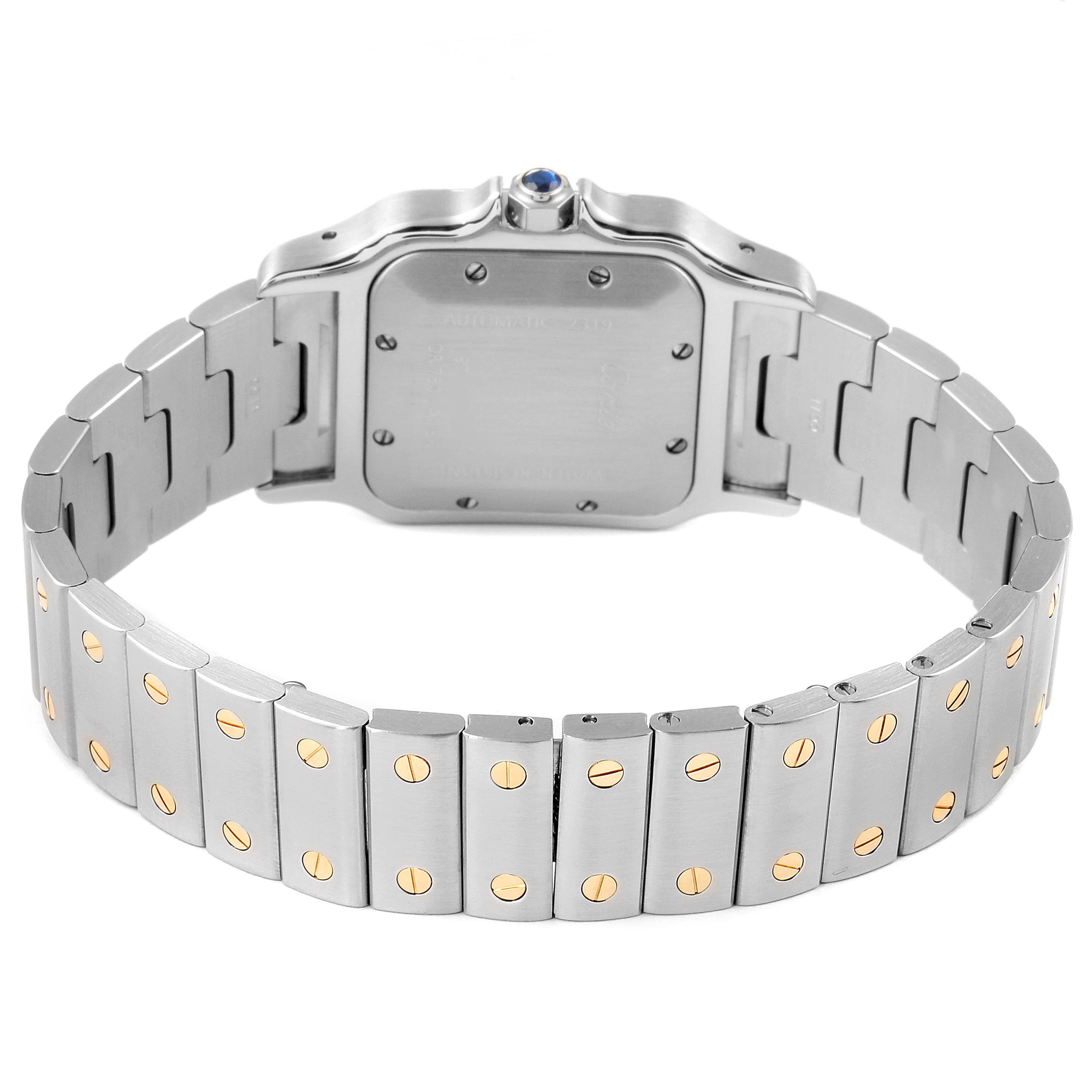 The image displays the back view of a Cartier Santos W20058C4 Men
s Steel and Gold (two tone) Silver Dial W20058C4 Men
s Steel and Gold (two tone) Silver Dial model watch, highlighting its metal bracelet and case.