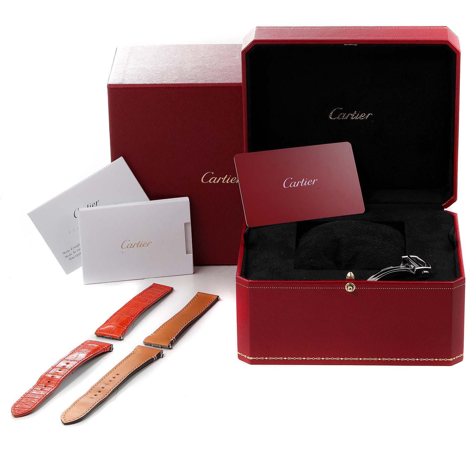 The image shows accessories including bands, manuals, and a red box for the Santos model by Cartier.