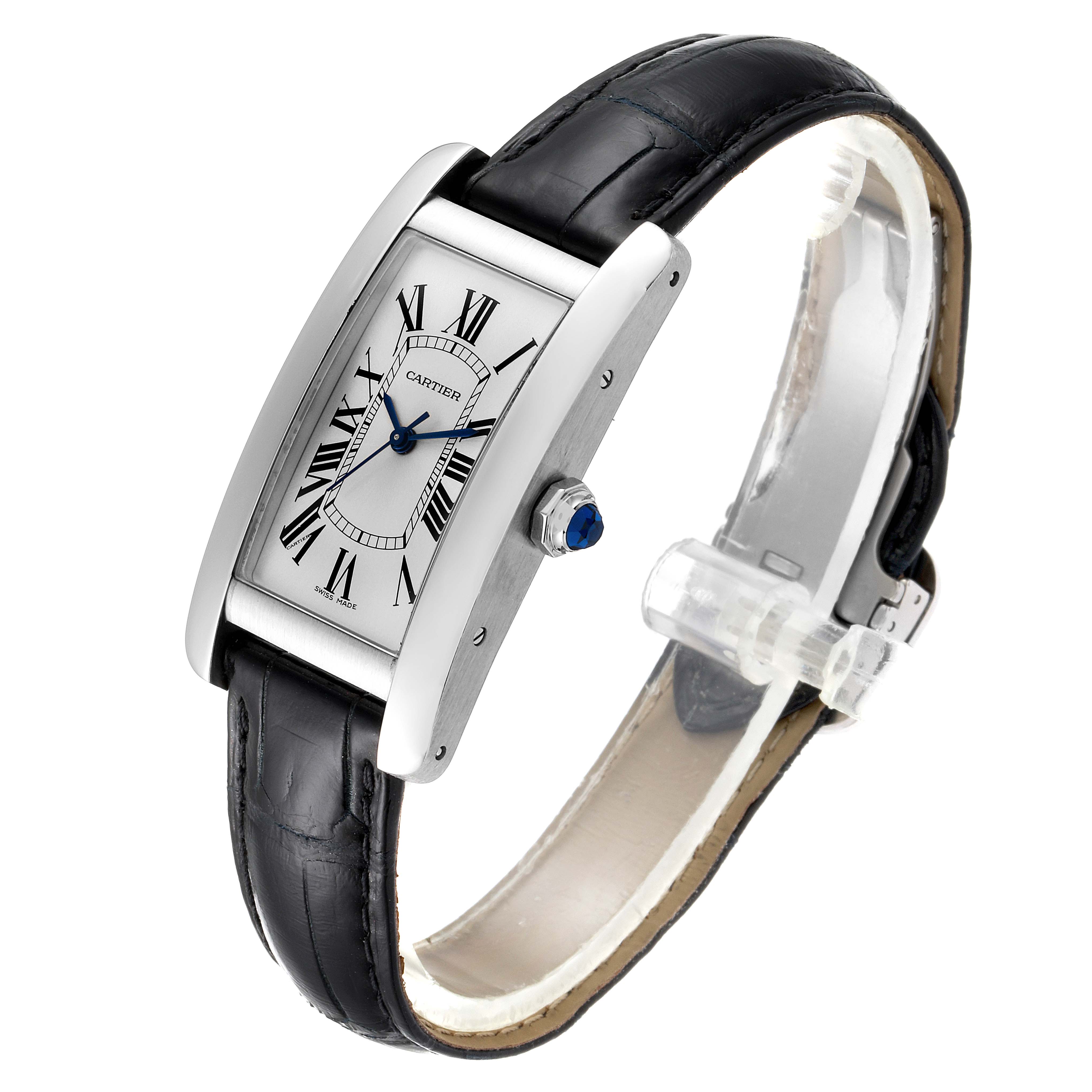 The Cartier Tank Américaine watch is shown from a front angle, displaying its face, crown, and black leather strap.