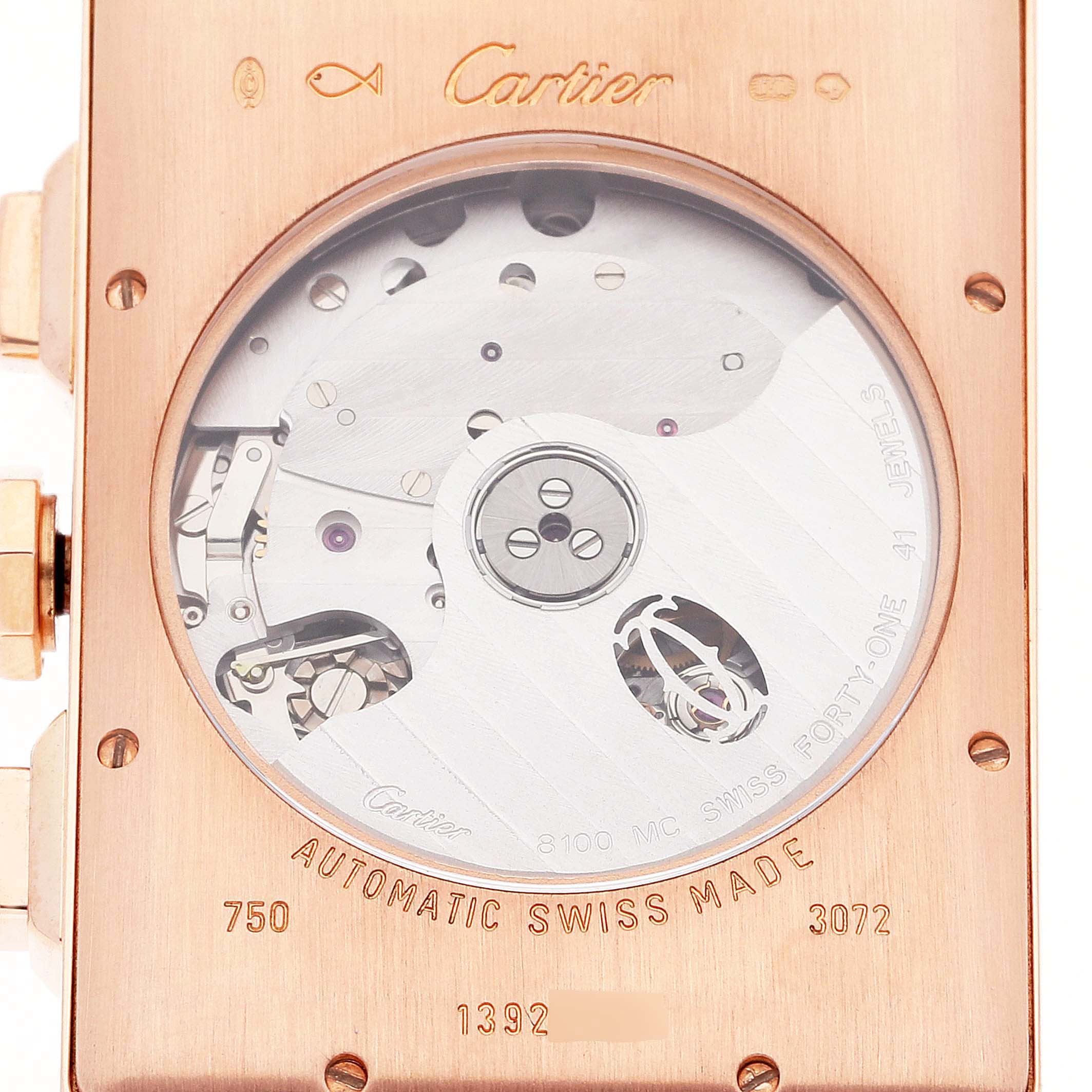 This image shows the back view of a Cartier Tank Americaine W2610751 Men's Rose Gold Silver Dial W2610751 Men's Rose Gold Silver Dial watch, revealing its automatic movement and inscriptions.