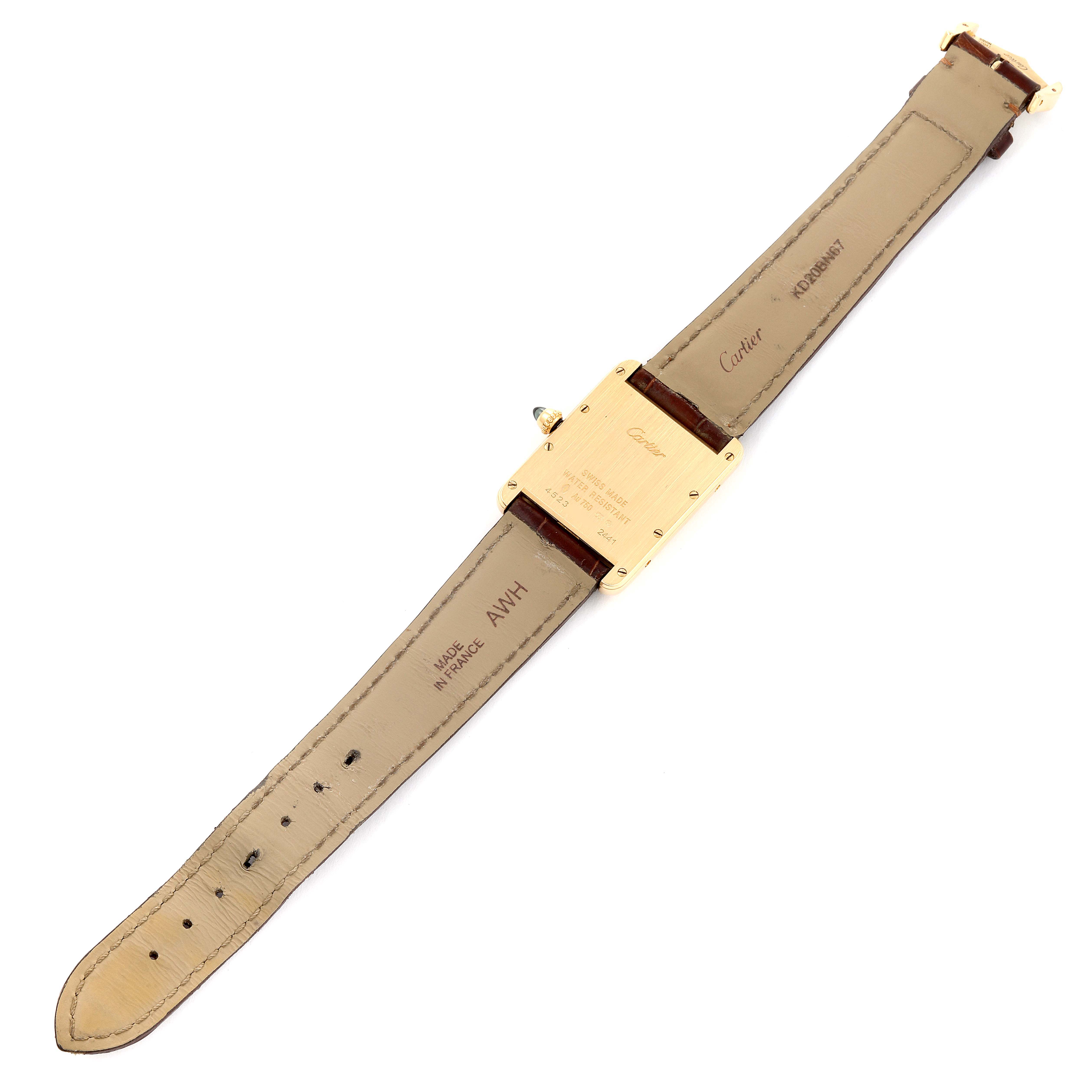 This image shows the back view of a Tank Louis watch by Cartier, highlighting the backside and leather straps.