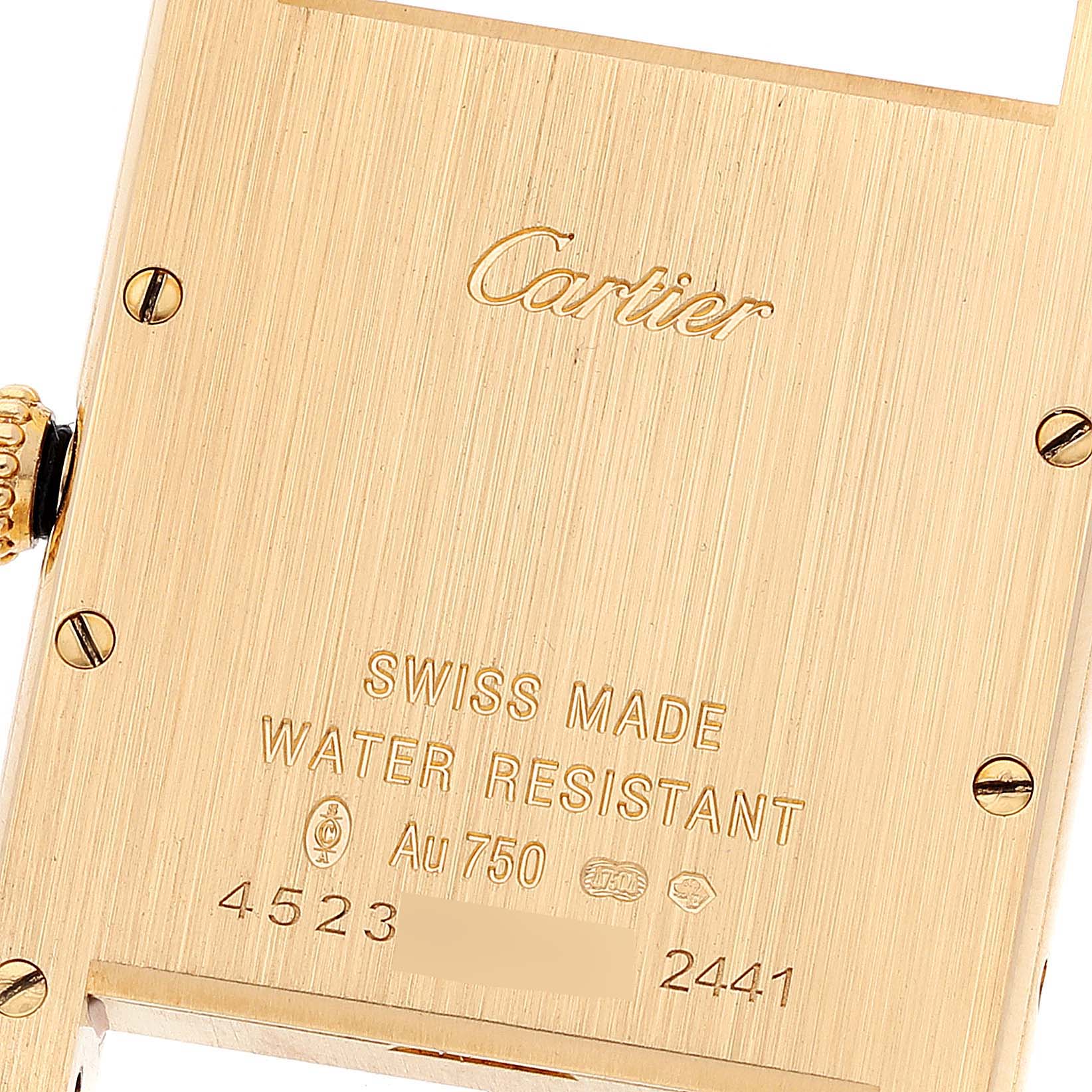 This image shows the back plate and crown of a Cartier Tank Louis W1529756 Men's Yellow Gold Silver Dial W1529756 Men's Yellow Gold Silver Dial watch at an angle.
