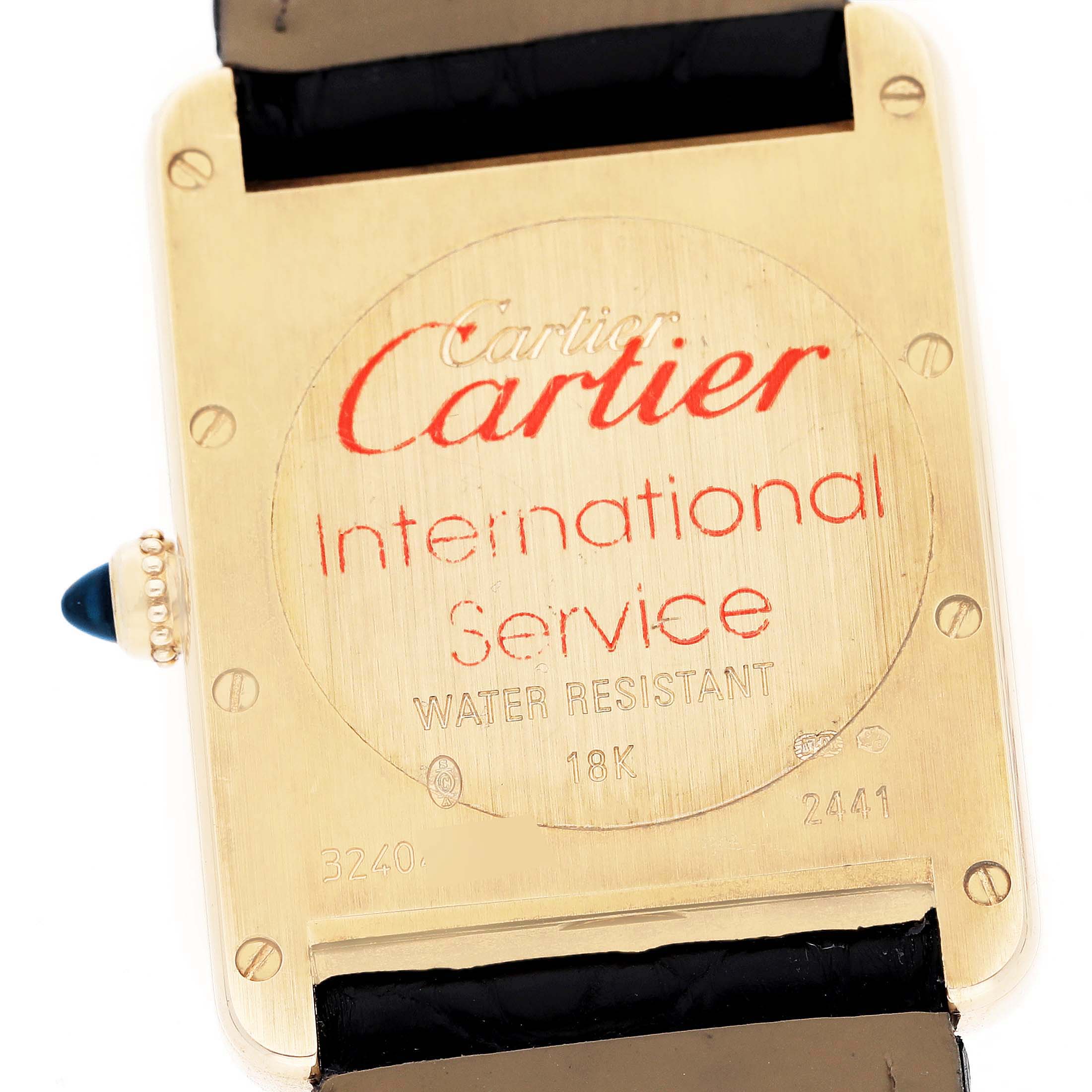 The image shows the back case of the Cartier Tank Louis W1529756 Men's Yellow Gold Silver Dial W1529756 Men's Yellow Gold Silver Dial watch, highlighting its engravings and blue crown.