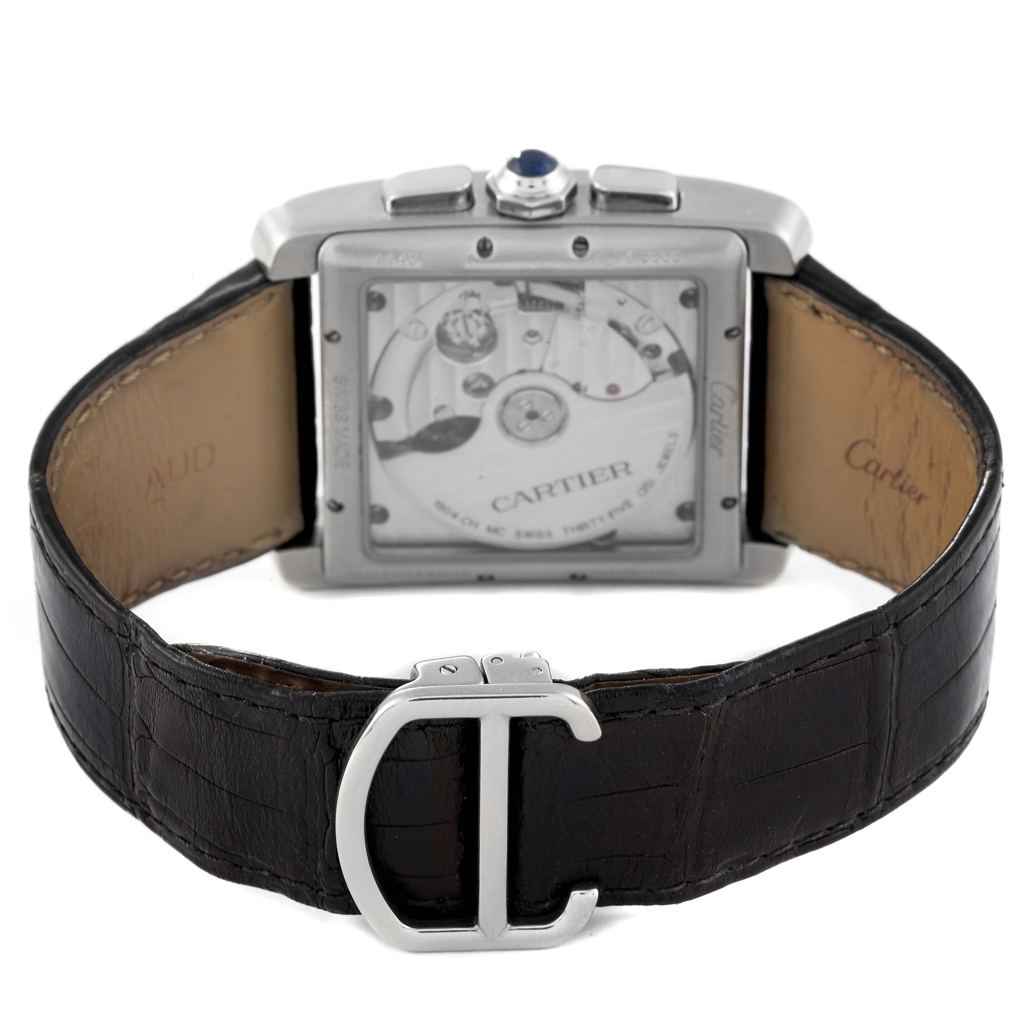 This image shows the rear view of a Cartier Tank MC W5330007 Men's Stainless Steel Silver Dial W5330007 Men's Stainless Steel Silver Dial watch, focusing on the open caseback and leather strap with a deployment clasp.