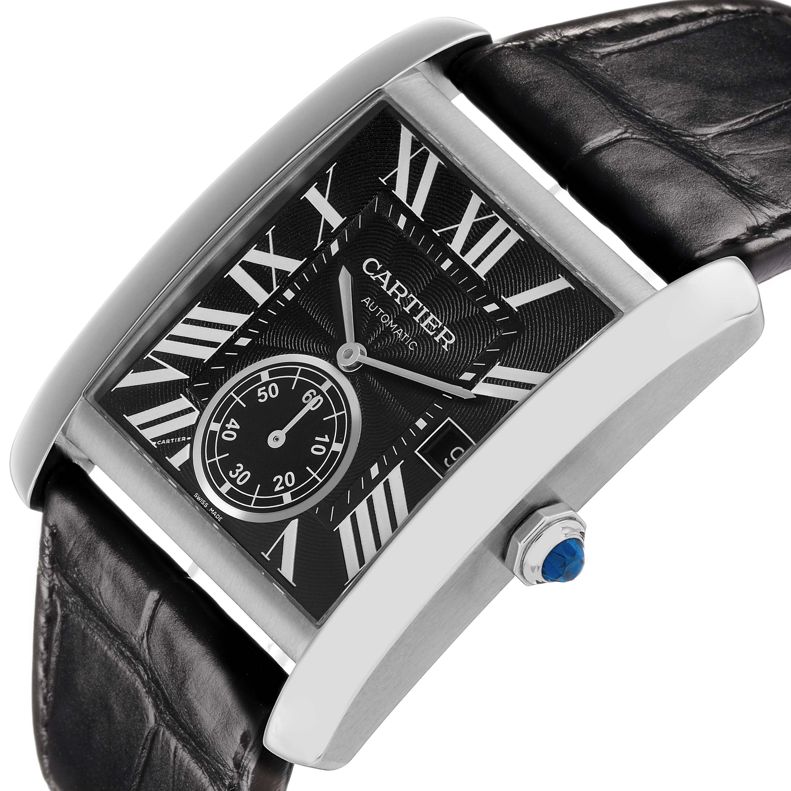 The Cartier Tank MC W5330004 Men's Stainless Steel Black Dial watch is shown at an angled close-up, displaying the dial, crown with a blue cabochon, and part of the leather strap.