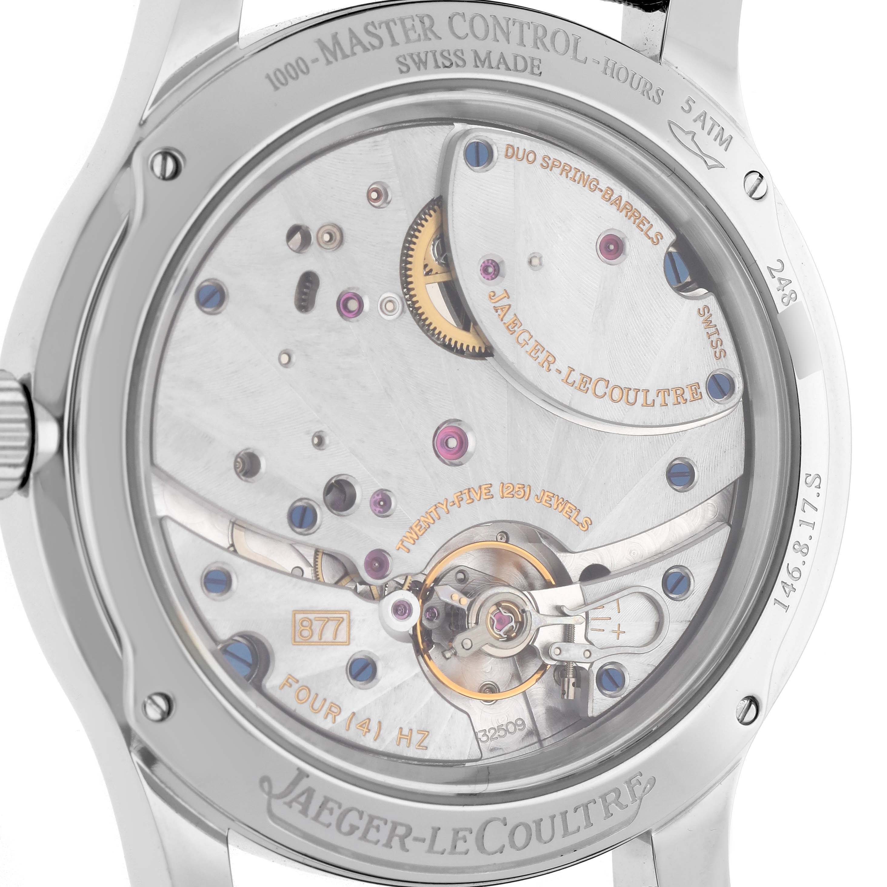The image shows the back of a Jaeger-LeCoultre Master model, displaying its intricate movement and components through a transparent case back.