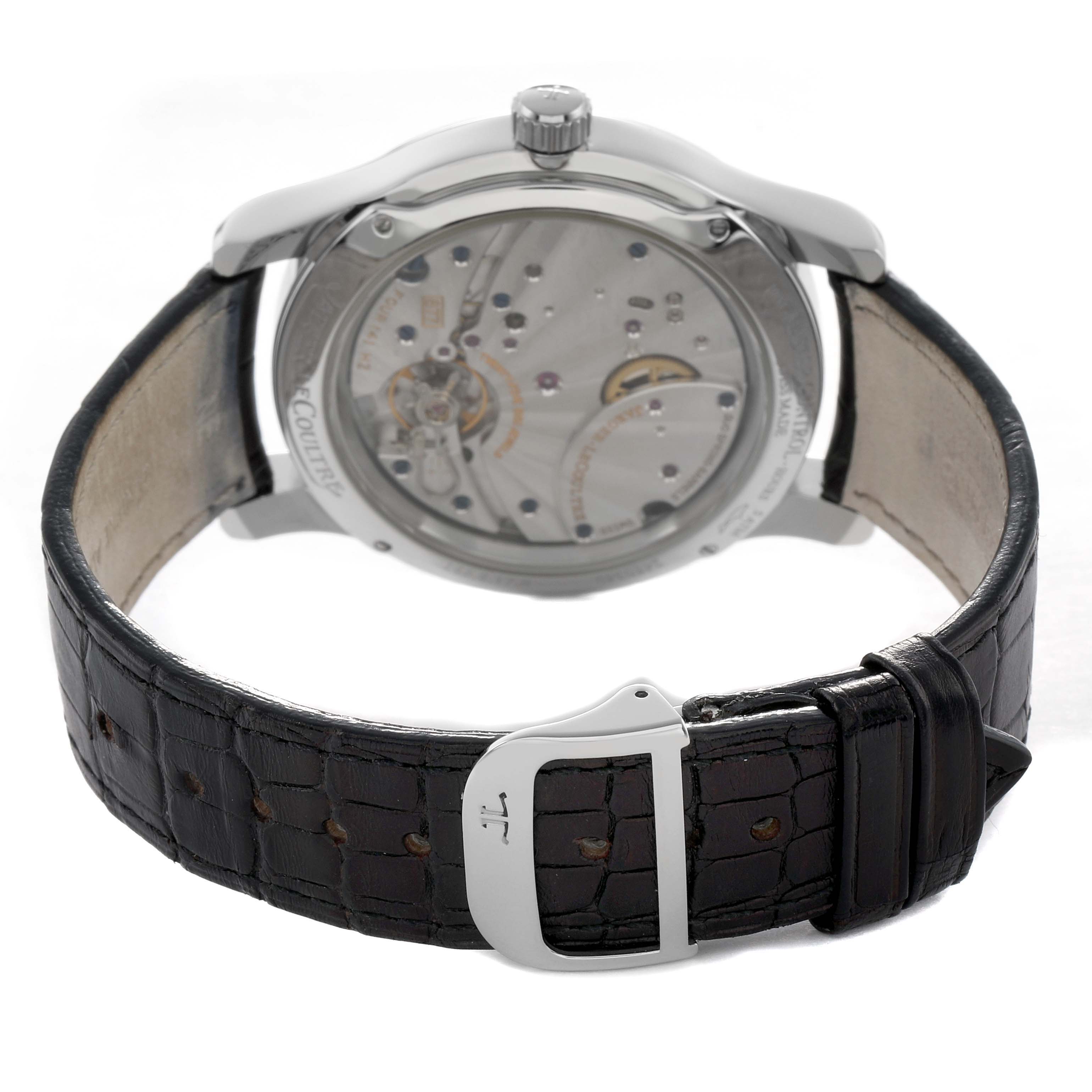 The image shows the back view of a Jaeger-LeCoultre Master model, highlighting the movement and leather strap with buckle.