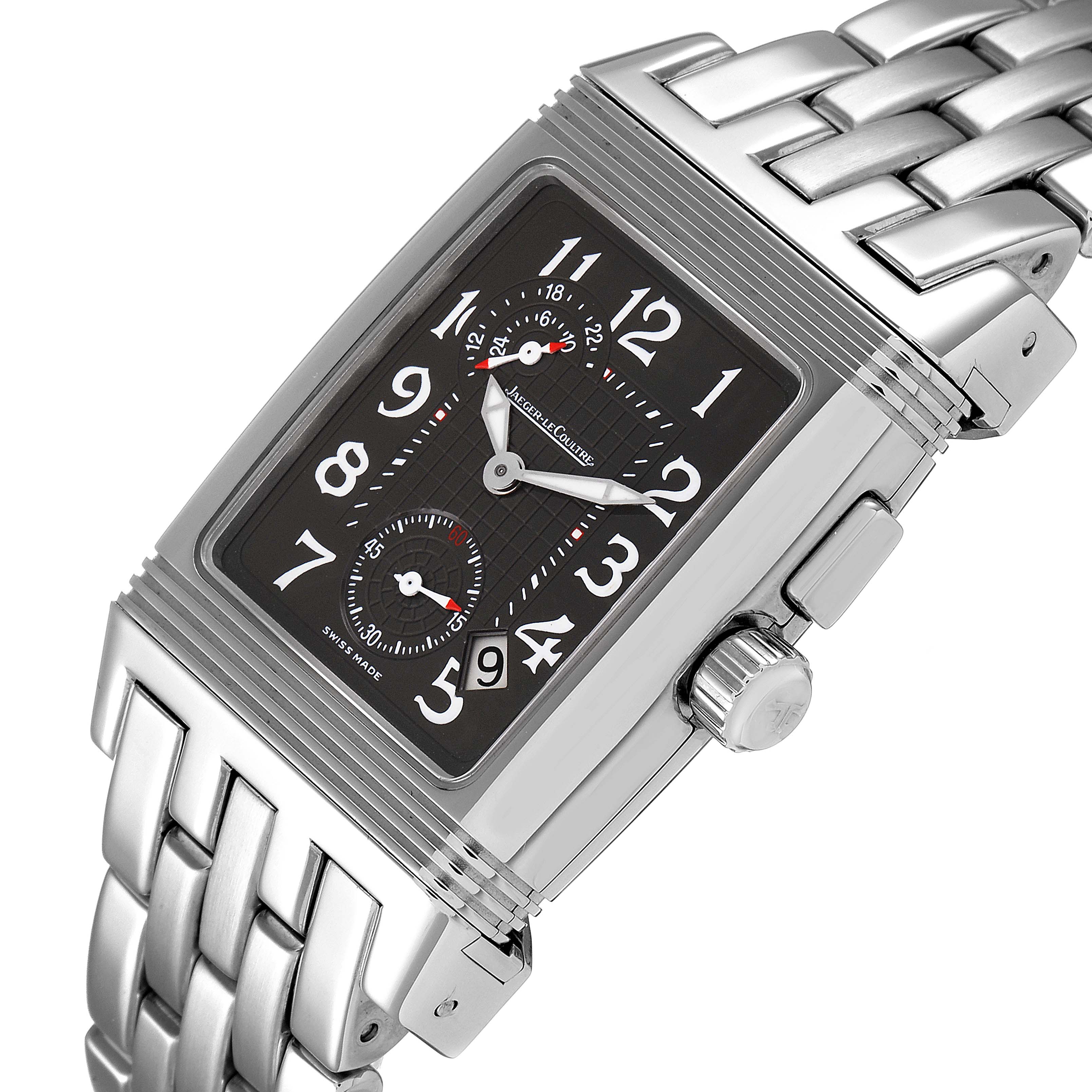 The image shows a close-up of the Jaeger LeCoultre Reverso 295.8.51 Men's Stainless Steel Silver Dial 295.8.51 Men's Stainless Steel Silver Dial watch face, crown, and part of the stainless steel bracelet at an angled view.