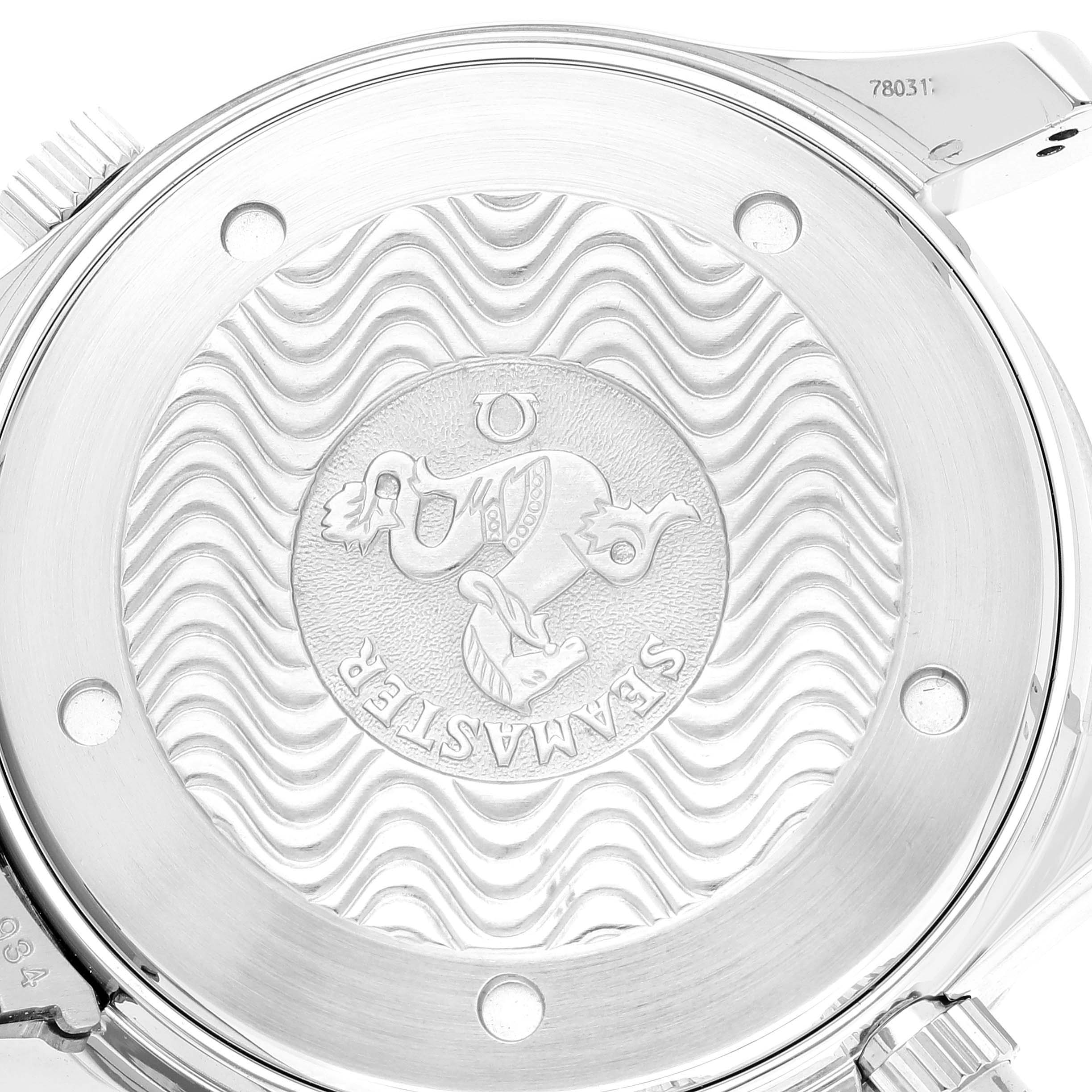 This is an angled close-up of the Omega Seamaster 2594.50.00 Men's Stainless Steel Black Dial 2594.50.00 Men's Stainless Steel Black Dial watch case back, showing the engraved emblem and wave pattern.