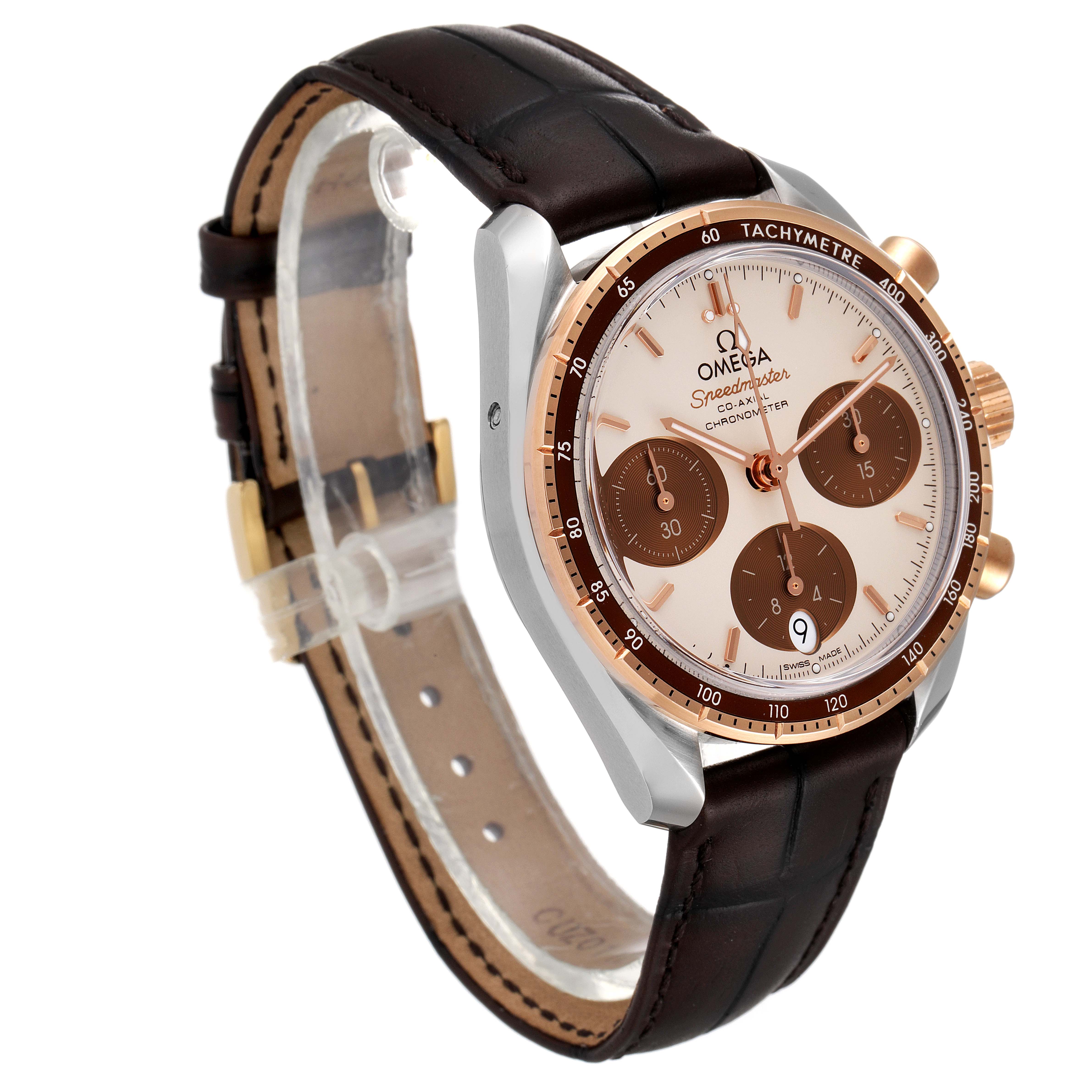 The image shows an Omega Speedmaster 324.23.38.50.02.002 Men's Steel and Gold (two tone) Silver Dial 324.23.38.50.02.002 Men's Steel and Gold (two tone) Silver Dial watch at a three-quarter angle, highlighting its face, case, and leather strap.