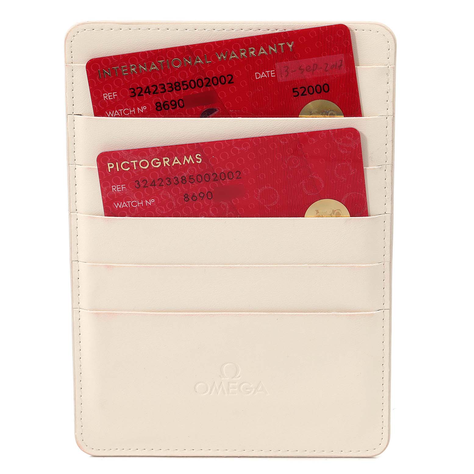 The image shows a close-up of two Omega Speedmaster 324.23.38.50.02.002 Men's Steel and Gold (two tone) Silver Dial 324.23.38.50.02.002 Men's Steel and Gold (two tone) Silver Dial cards (International Warranty and Pictograms) in a white cardholder.