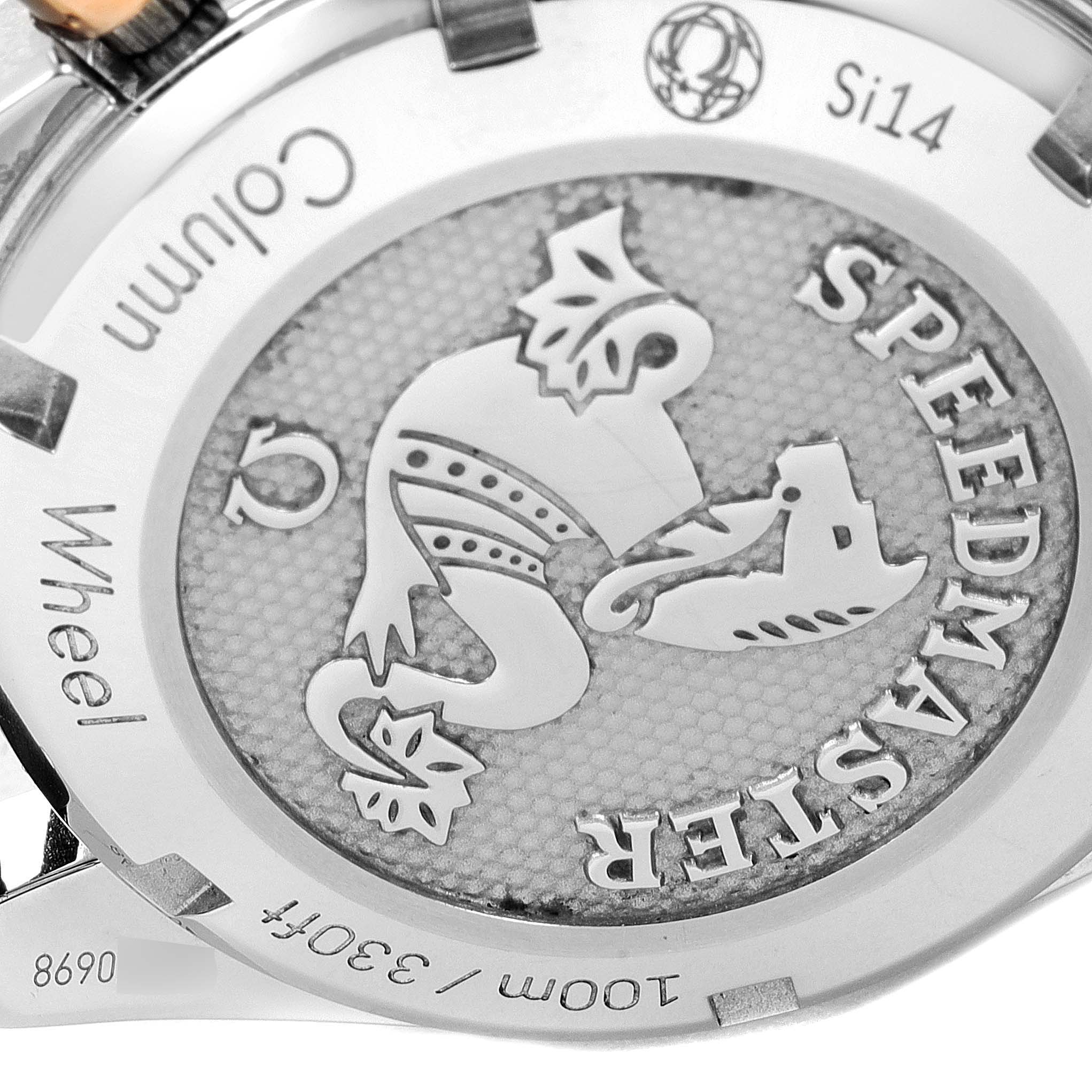 This image shows the back casing of an Omega Speedmaster 324.23.38.50.02.002 Men's Steel and Gold (two tone) Silver Dial 324.23.38.50.02.002 Men's Steel and Gold (two tone) Silver Dial watch, highlighting engravings and the logo.