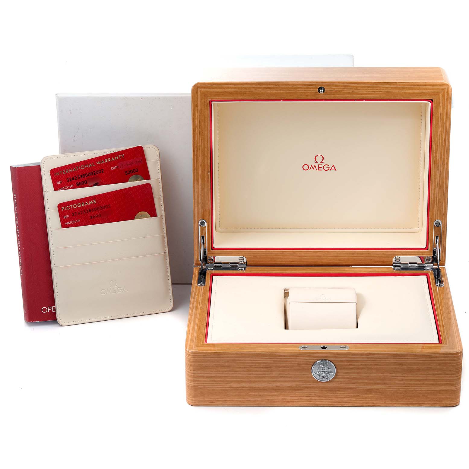 The image shows an Omega Speedmaster 324.23.38.50.02.002 Men's Steel and Gold (two tone) Silver Dial 324.23.38.50.02.002 Men's Steel and Gold (two tone) Silver Dial watch box, open with cards and a booklet placed beside it.