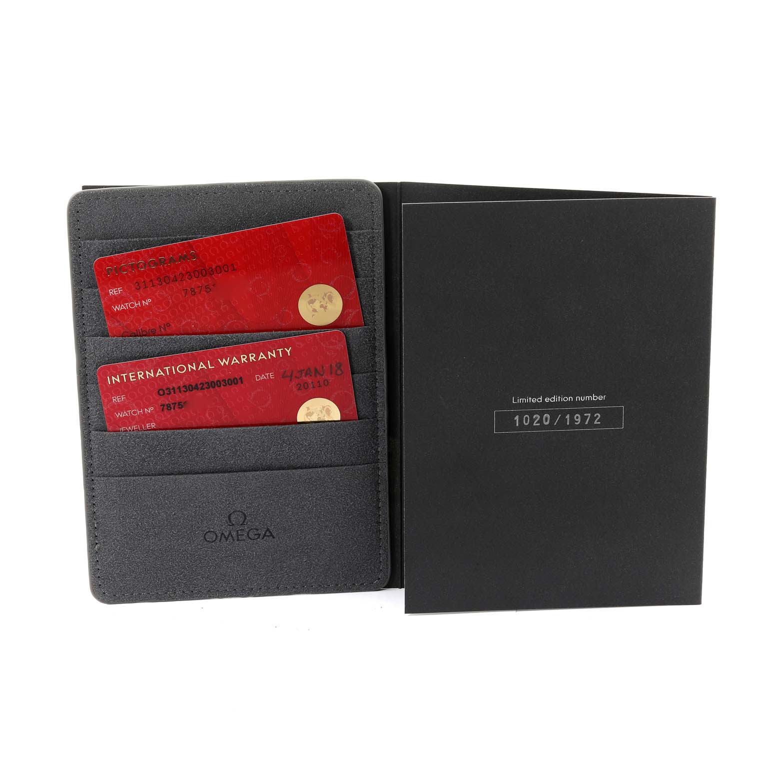 The image shows warranty cards and a limited edition certificate folder for an Omega Speedmaster 311.30.42.30.03.001 Men's Stainless Steel Blue Dial 311.30.42.30.03.001 Men's Stainless Steel Blue Dial.