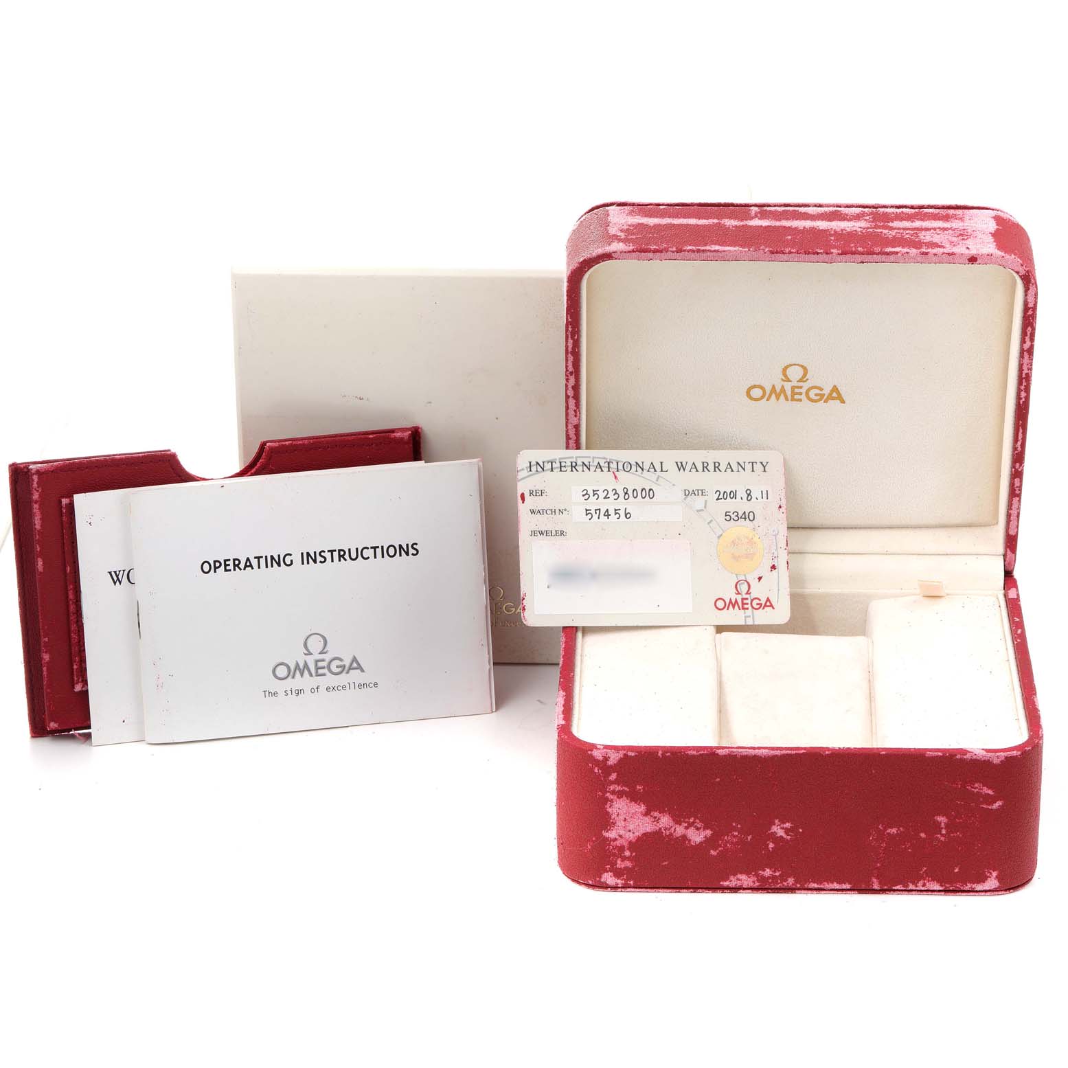 The image shows an Omega Speedmaster 3523.80.00 Men
s Stainless Steel Blue Dial 3523.80.00 Men
s Stainless Steel Blue Dial watch
s accessories, including the box, warranty card, and operating instructions.