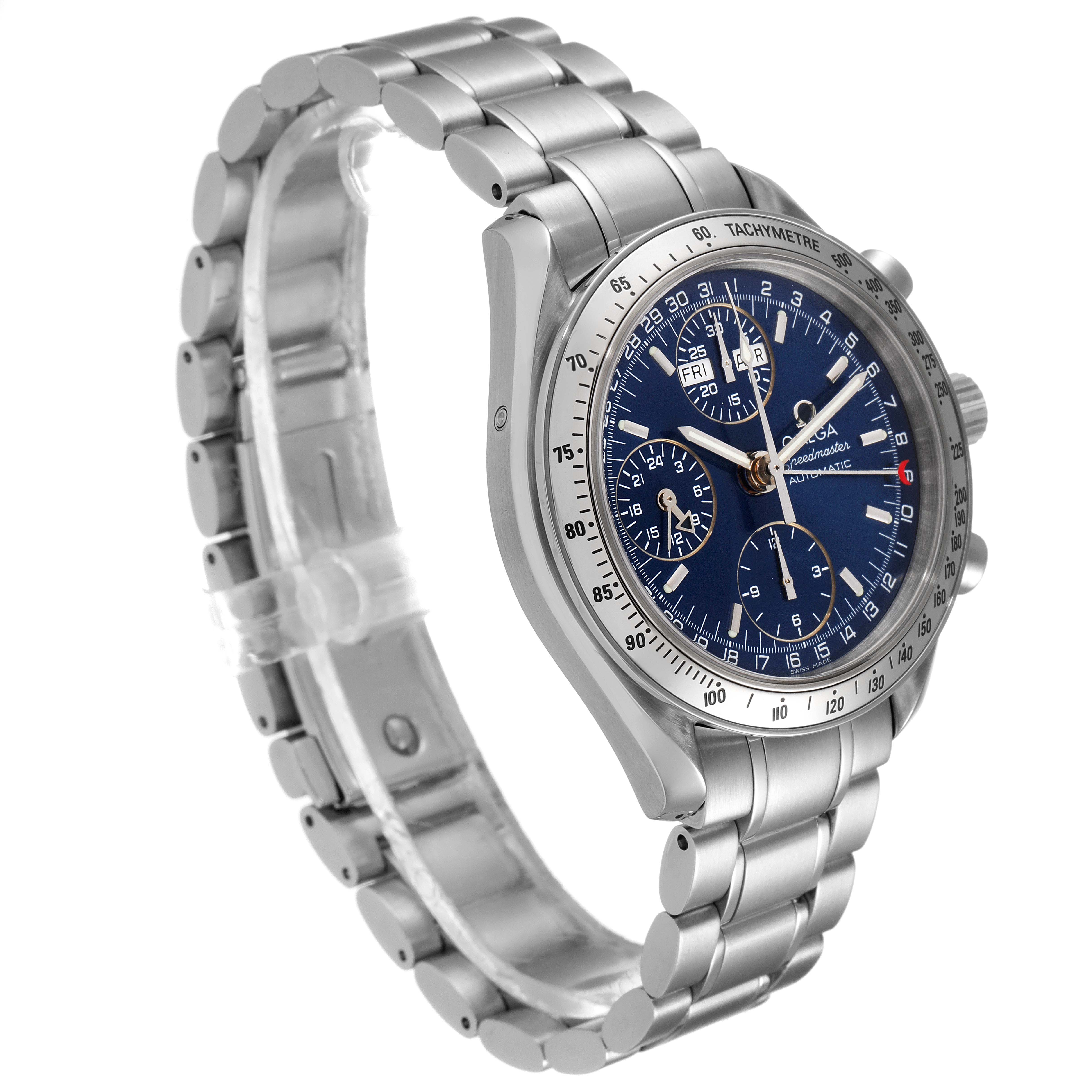The Omega Speedmaster 3523.80.00 Men
s Stainless Steel Blue Dial 3523.80.00 Men
s Stainless Steel Blue Dial watch is shown at a slight side angle, displaying its silver metal bracelet, blue dial, and tachymetre bezel.