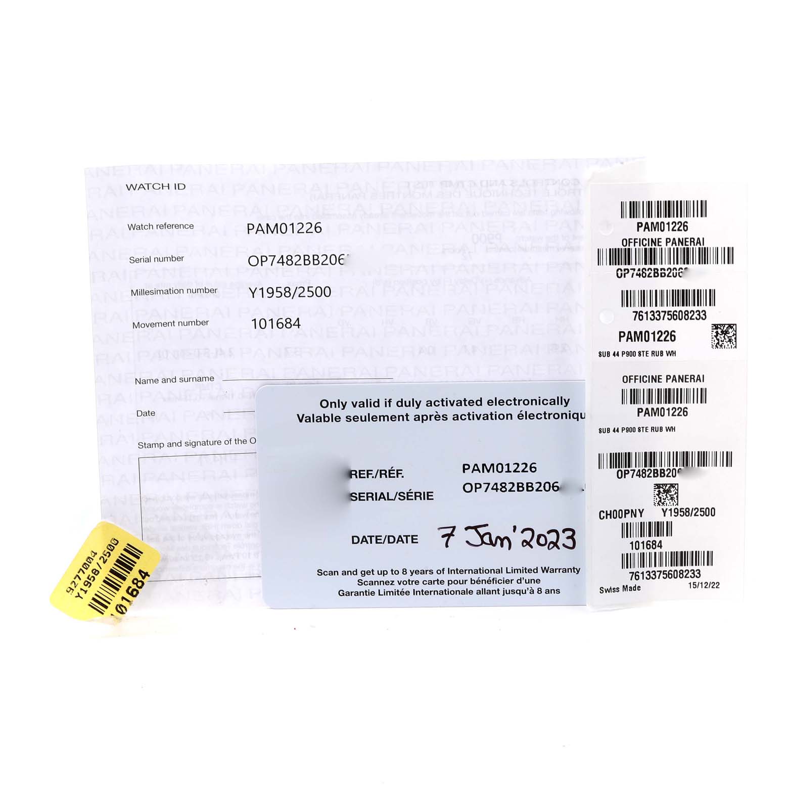 This image shows warranty documents and tags for the Panerai Submersible PAM01226 Men
s Stainless Steel White Dial PAM01226 Men
s Stainless Steel White Dial model PAM01226.