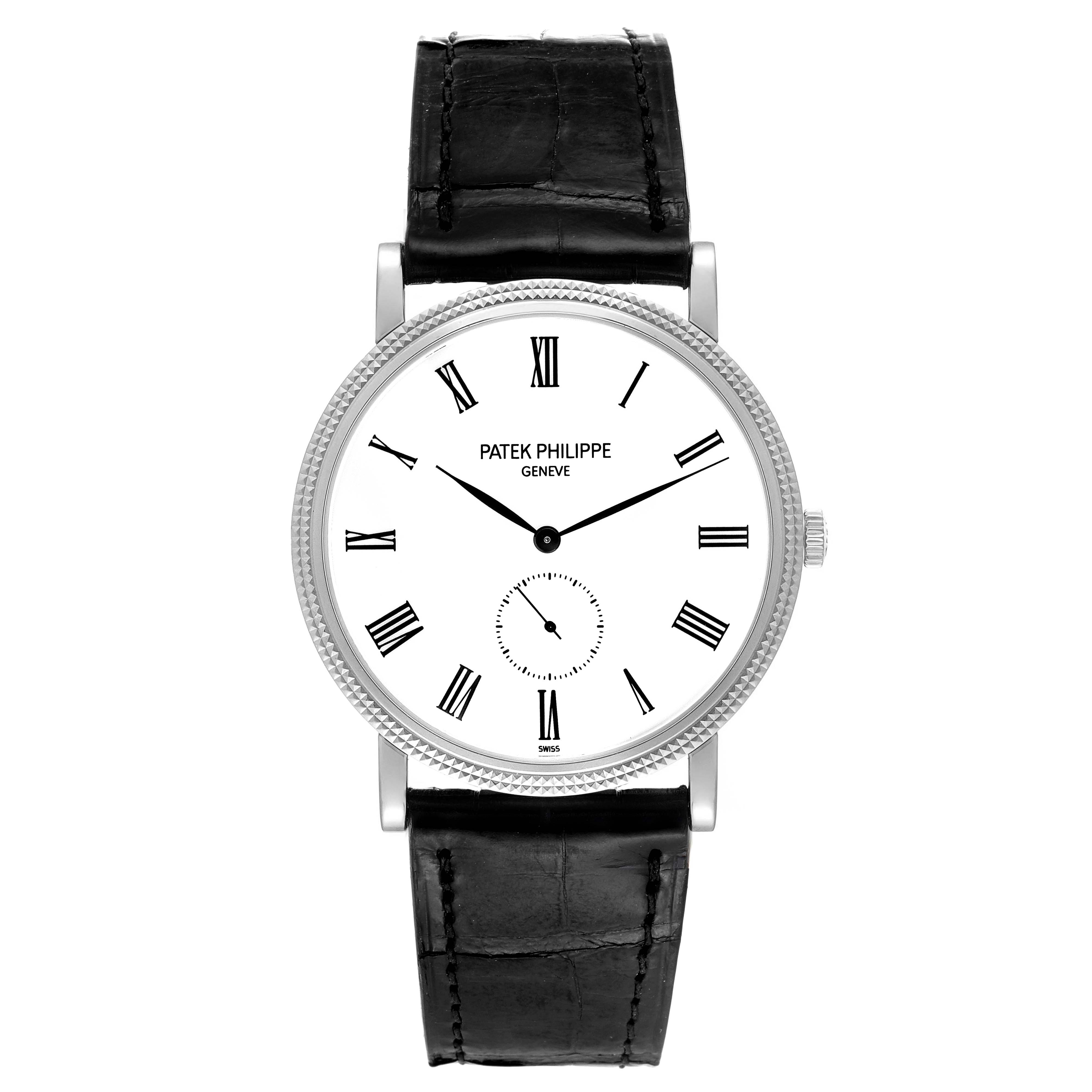 The image shows a frontal view of a Patek Philippe Calatrava 5119G Men's White Gold White Dial 5119G Men's White Gold White Dial watch with a black leather strap and a white dial with Roman numerals.