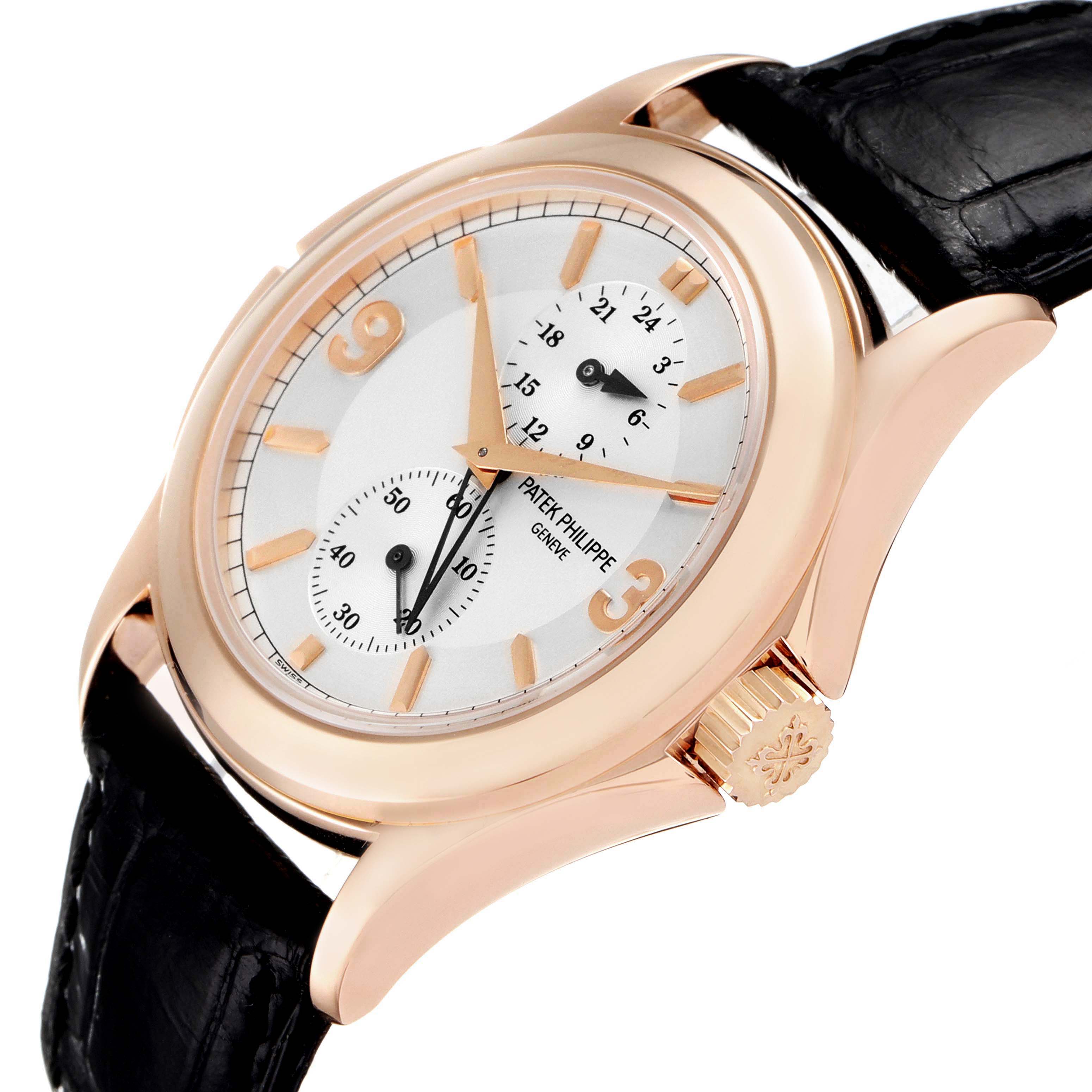 The image shows a close-up angled view of the Patek Philippe Calatrava 5134R-011 Men
s Rose Gold Silver Dial 5134R-011 Men
s Rose Gold Silver Dial watch displaying its dial, case, crown, and leather strap.