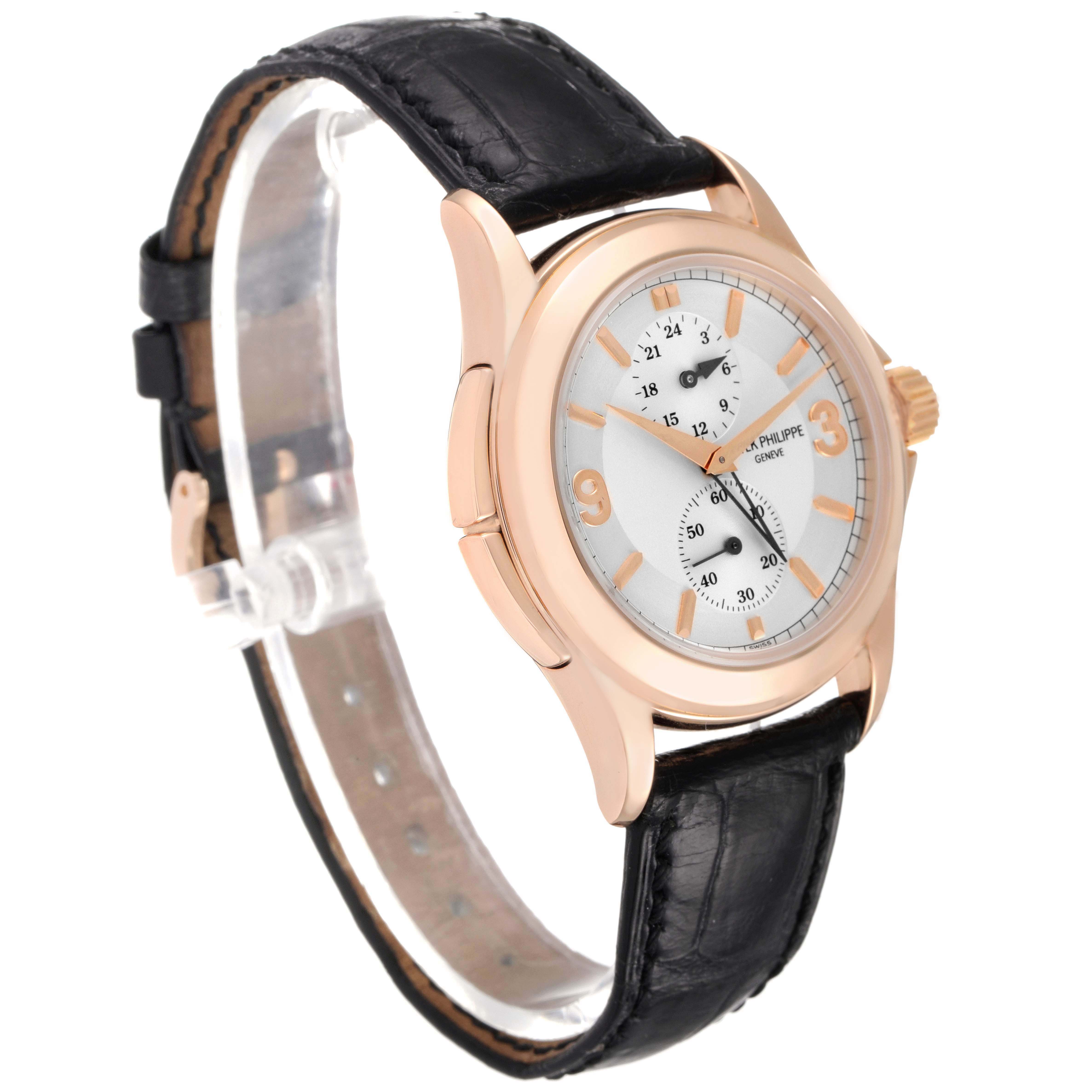 The Patek Philippe Calatrava 5134R-011 Men
s Rose Gold Silver Dial 5134R-011 Men
s Rose Gold Silver Dial watch is shown at a three-quarter angle, highlighting the face, case, and black leather strap.