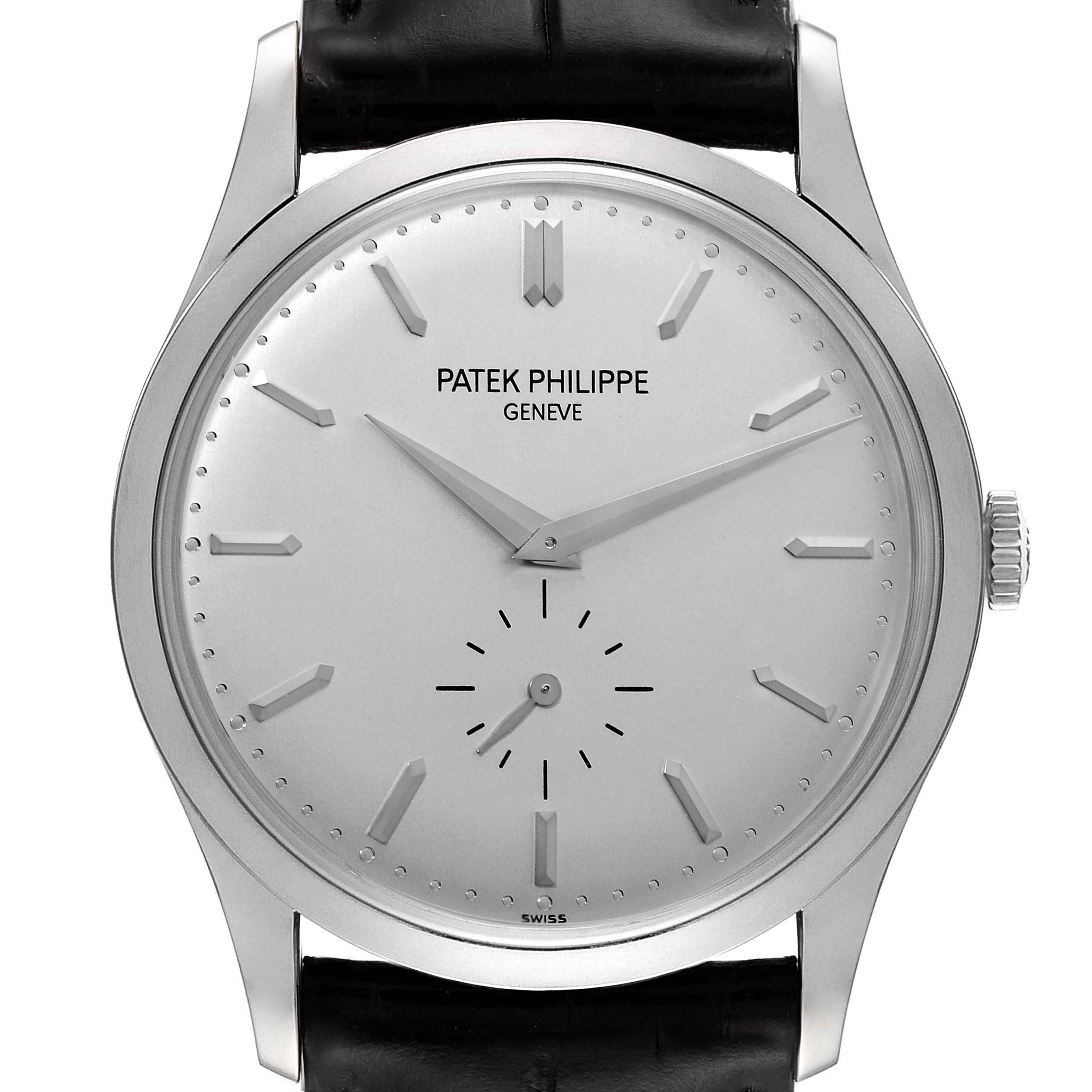 This image shows a front view of a Patek Philippe Calatrava 5196G Men's White Gold Silver Dial 5196G Men's White Gold Silver Dial watch, highlighting its dial, hands, and part of the black leather strap.