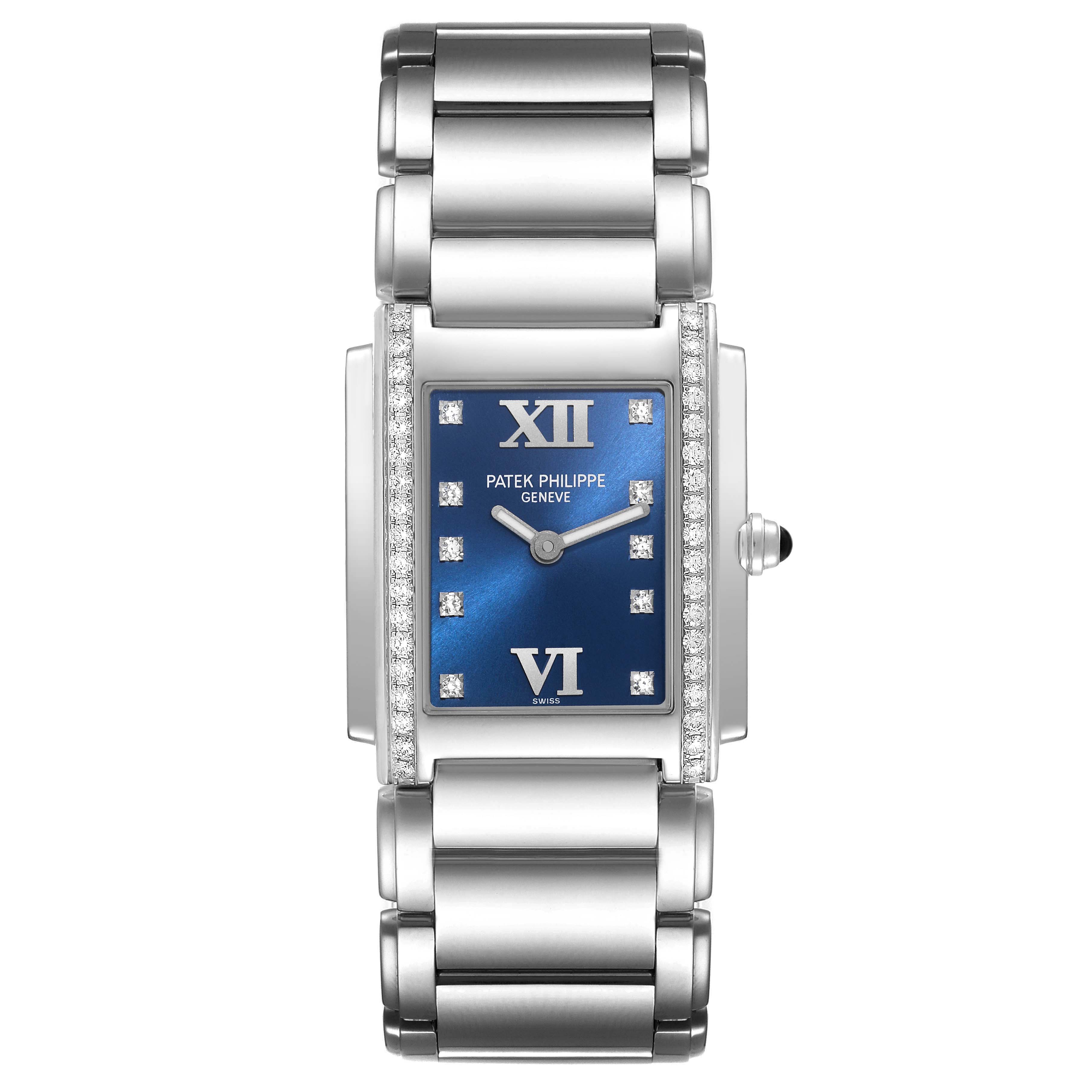 The image shows a front view of a Patek Philippe Twenty-4 4910/10A-012 Women's Stainless Steel Blue Dial 4910/10A-012 Women's Stainless Steel Blue Dial watch, highlighting the blue dial, diamond markers, and metal bracelet.