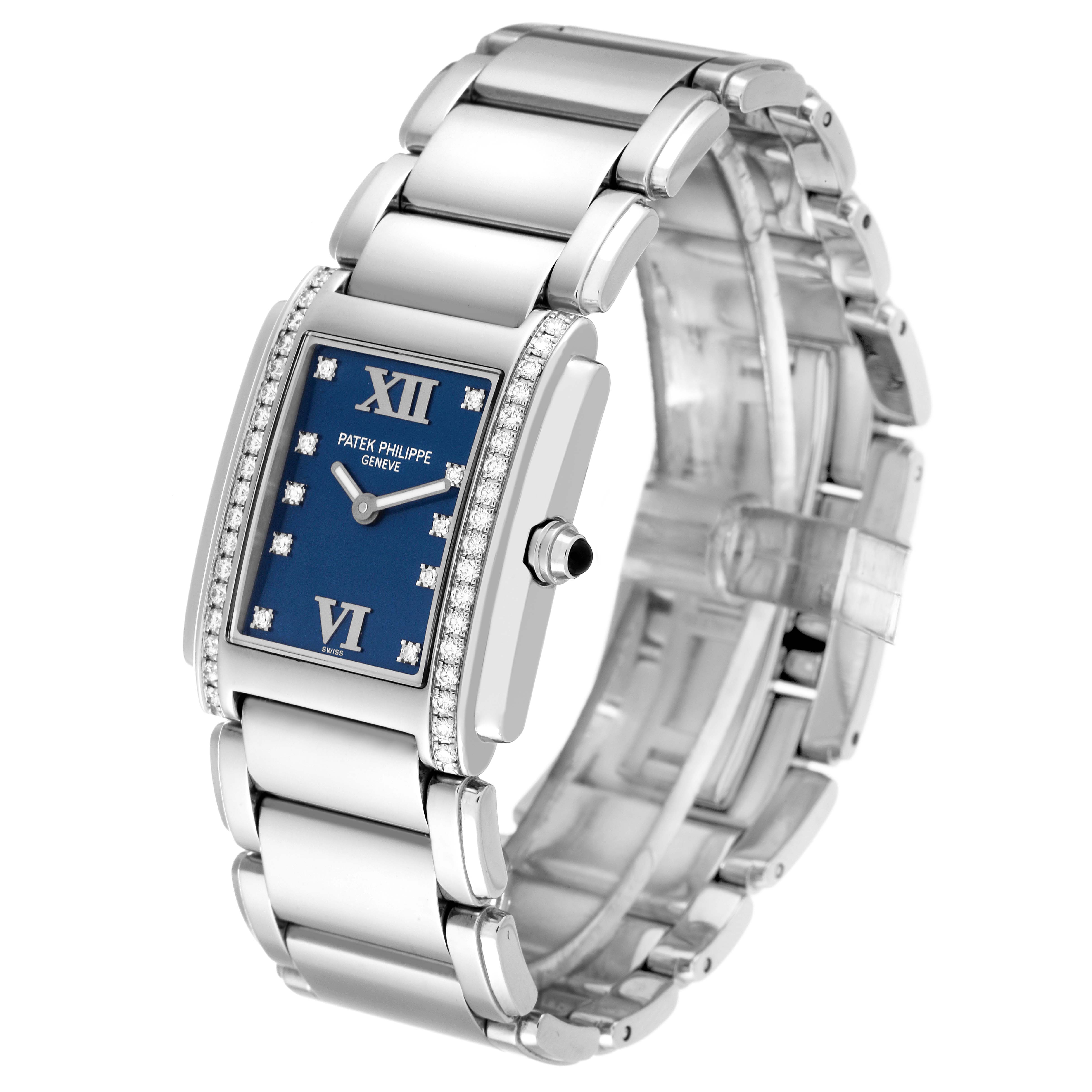 The image shows a Patek Philippe Twenty-4 4910/10A-012 Women's Stainless Steel Blue Dial 4910/10A-012 Women's Stainless Steel Blue Dial watch from a three-quarter angle, highlighting its blue dial and stainless steel bracelet.