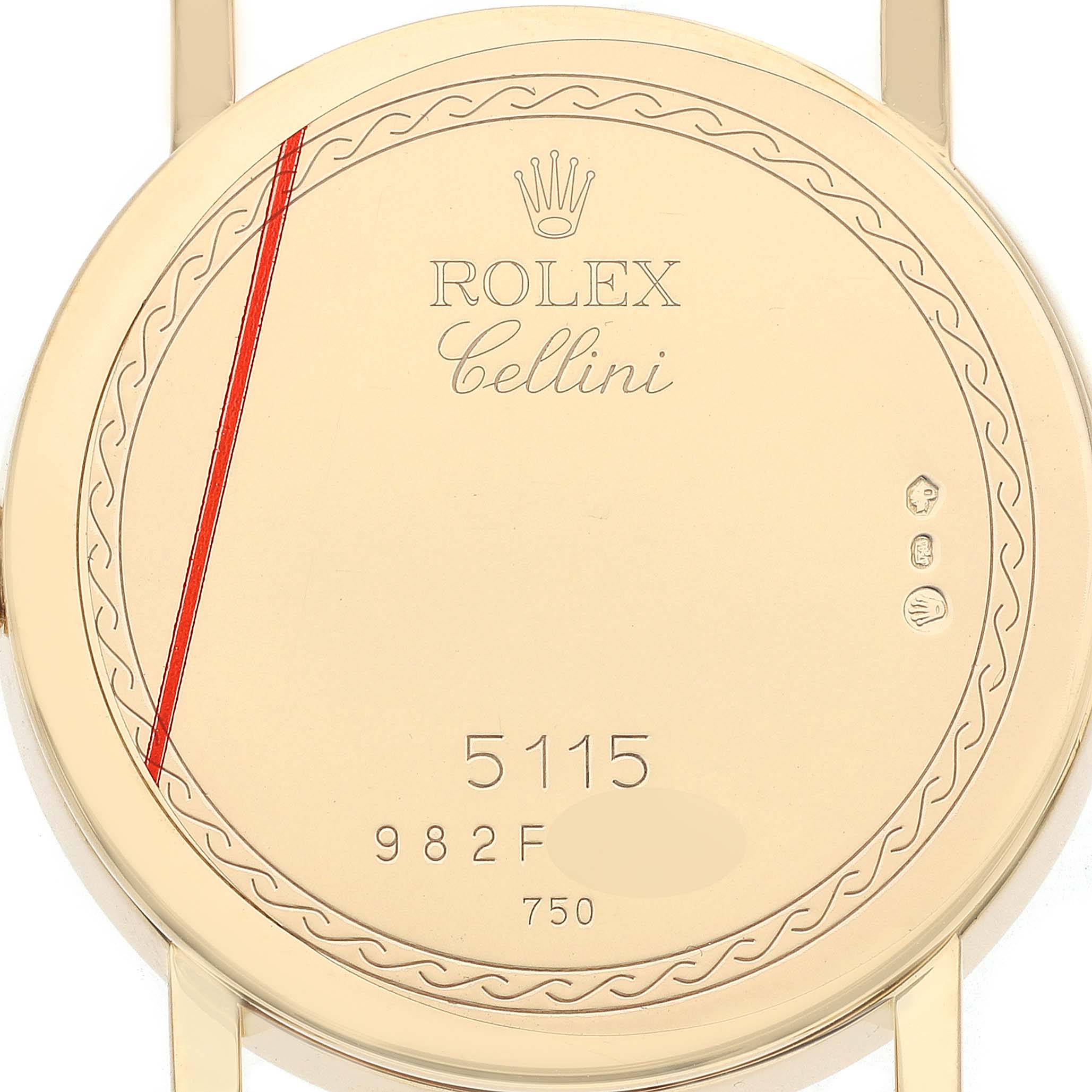 The image shows the back case of a Rolex Cellini 5115 Men's Yellow Gold Beige Dial watch with engraved details and hallmarks.