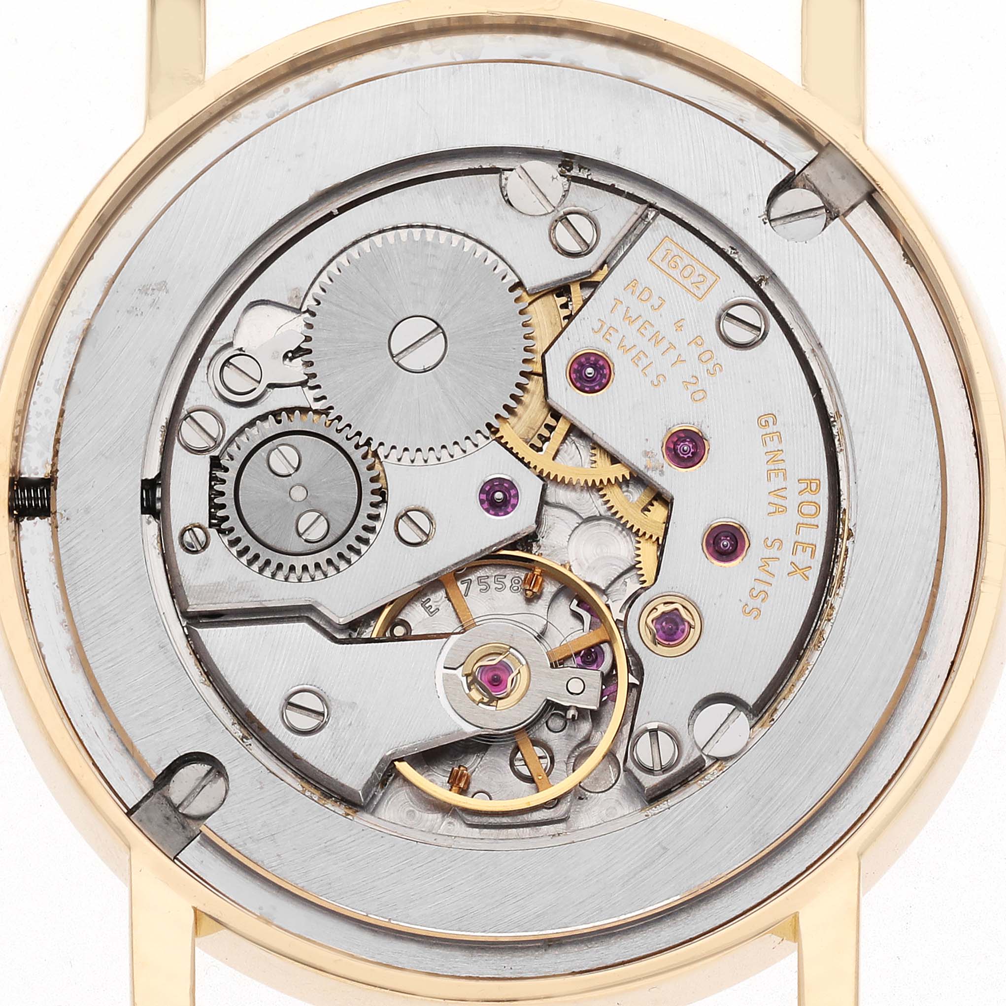 The image shows the back view of a Rolex Cellini 5115 Men's Yellow Gold Beige Dial, highlighting its intricate movement and gears.