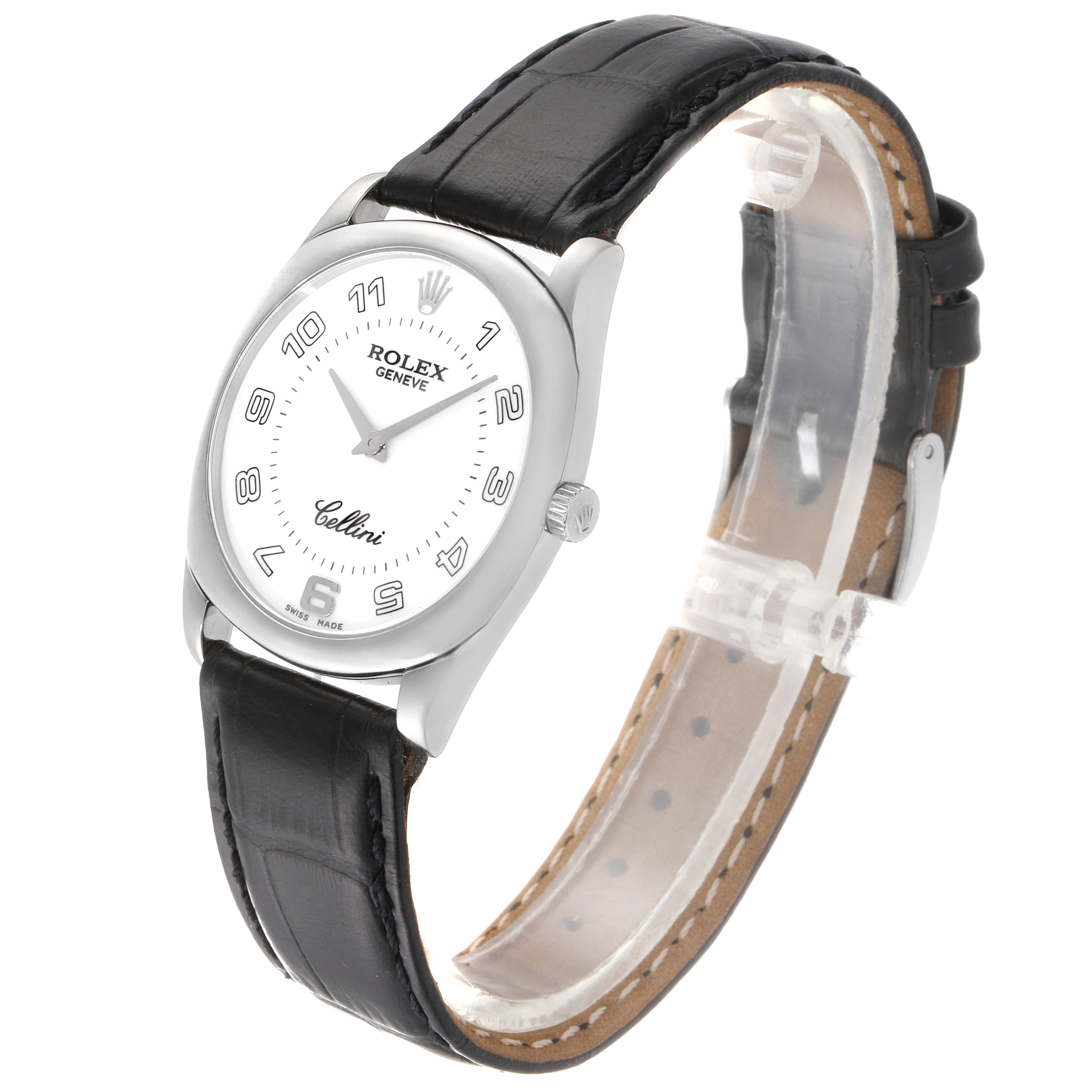 The Rolex Cellini 4233 Men's White Gold White Dial 4233 Men's White Gold White Dial watch is shown at an angled view, displaying its dial, case, crown, and leather strap.