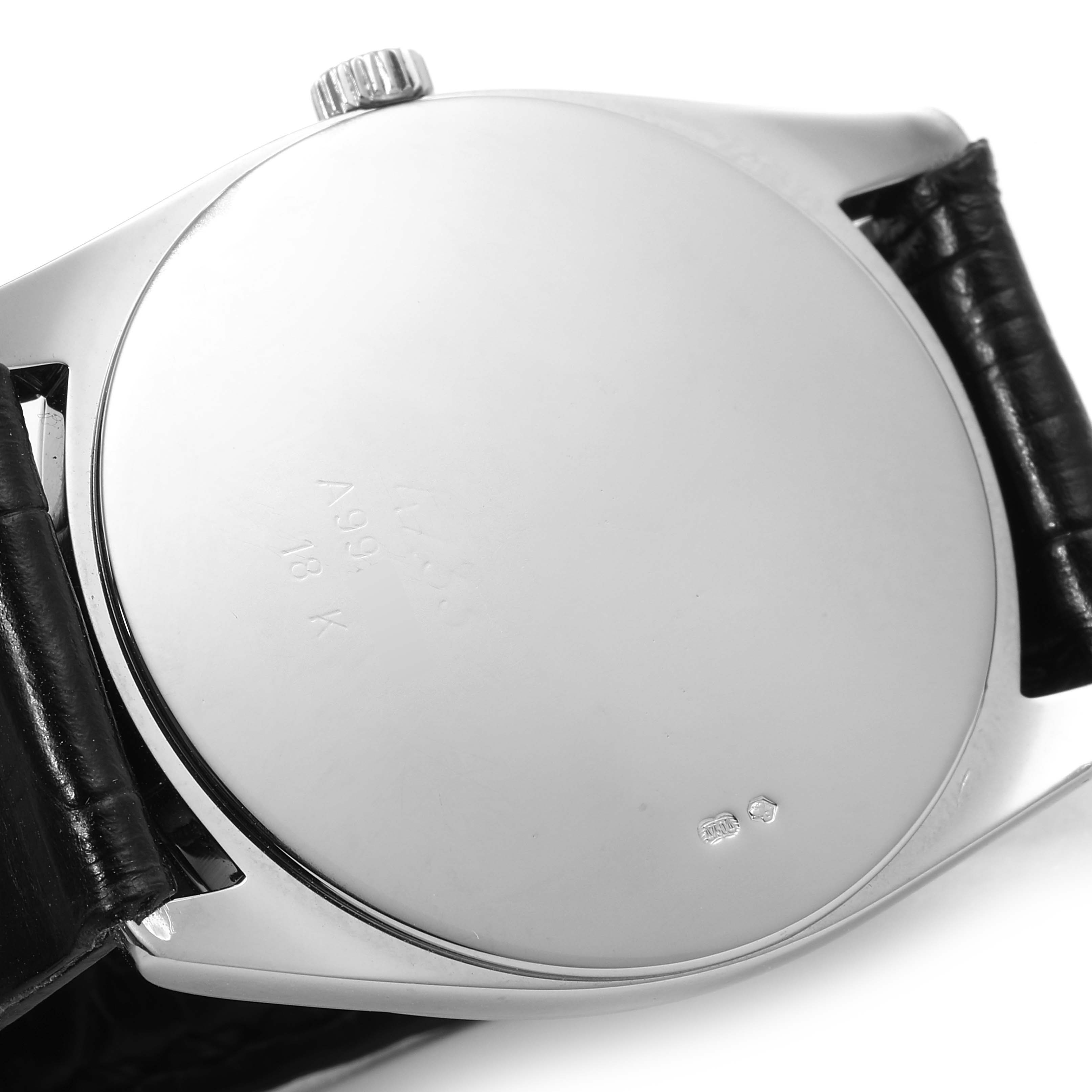 The image shows the back case and the strap of a Rolex Cellini 4233 Men's White Gold White Dial 4233 Men's White Gold White Dial watch from an angled view.