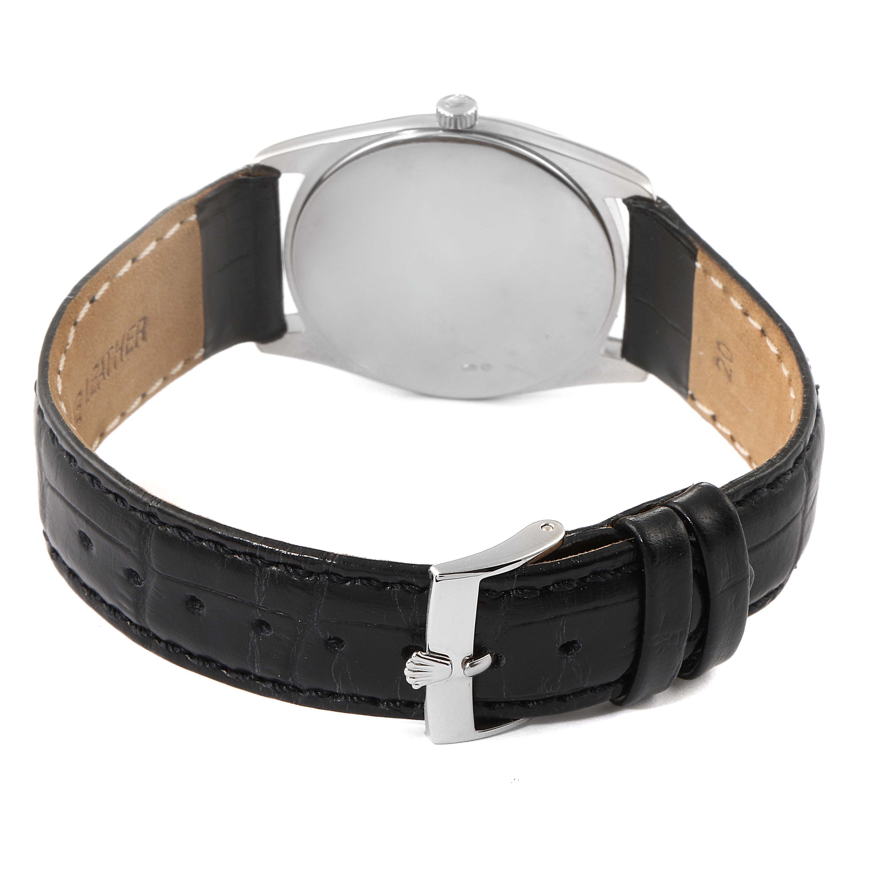 This image shows the back view of the Rolex Cellini 4233 Men's White Gold White Dial 4233 Men's White Gold White Dial watch, highlighting the case, buckle, and leather strap.