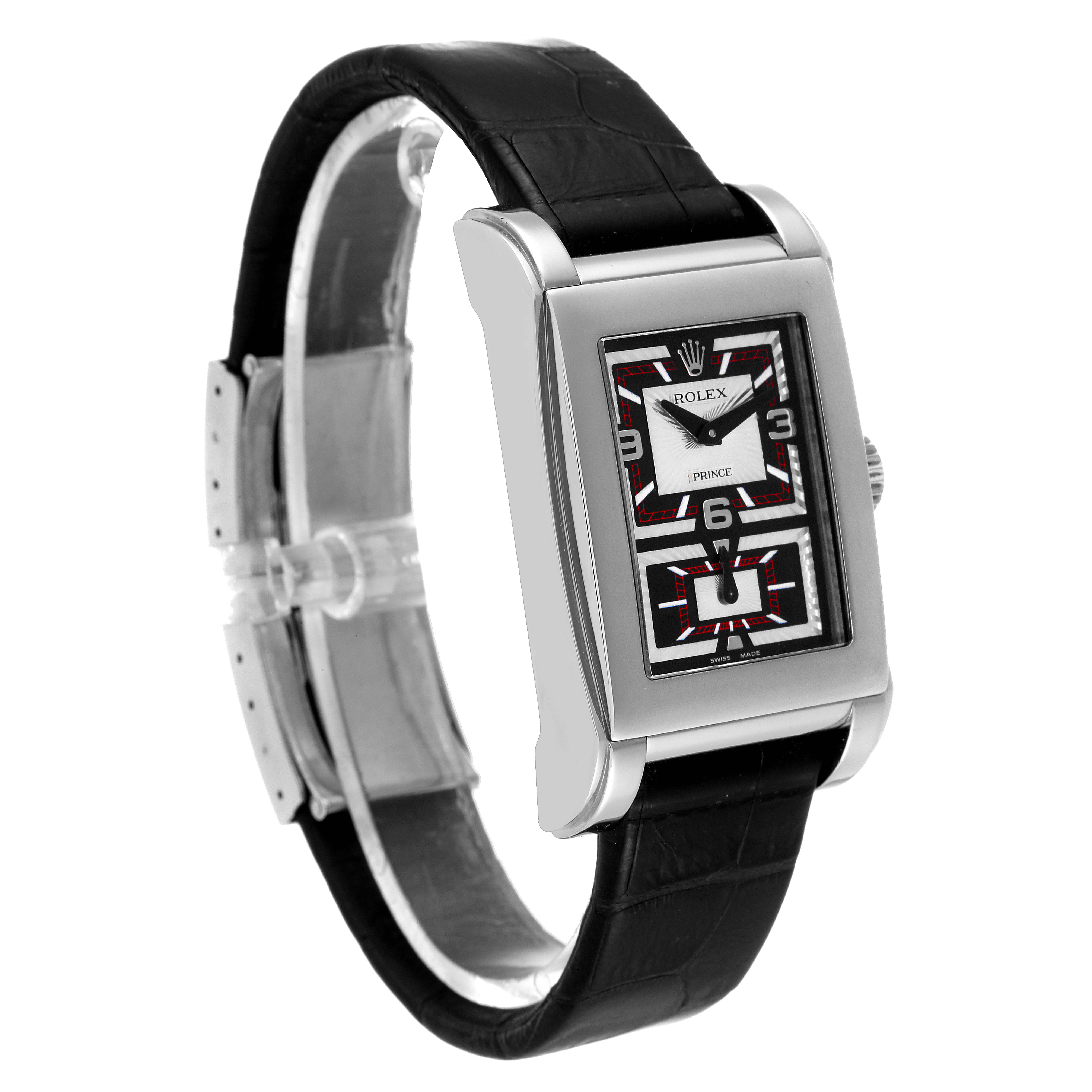 The Rolex Cellini 5443/9 Men's White Gold Black Dial 5443/9 Men's White Gold Black Dial watch is shown at a 3/4 angle, highlighting the rectangular face, black leather strap, and intricate dial design.