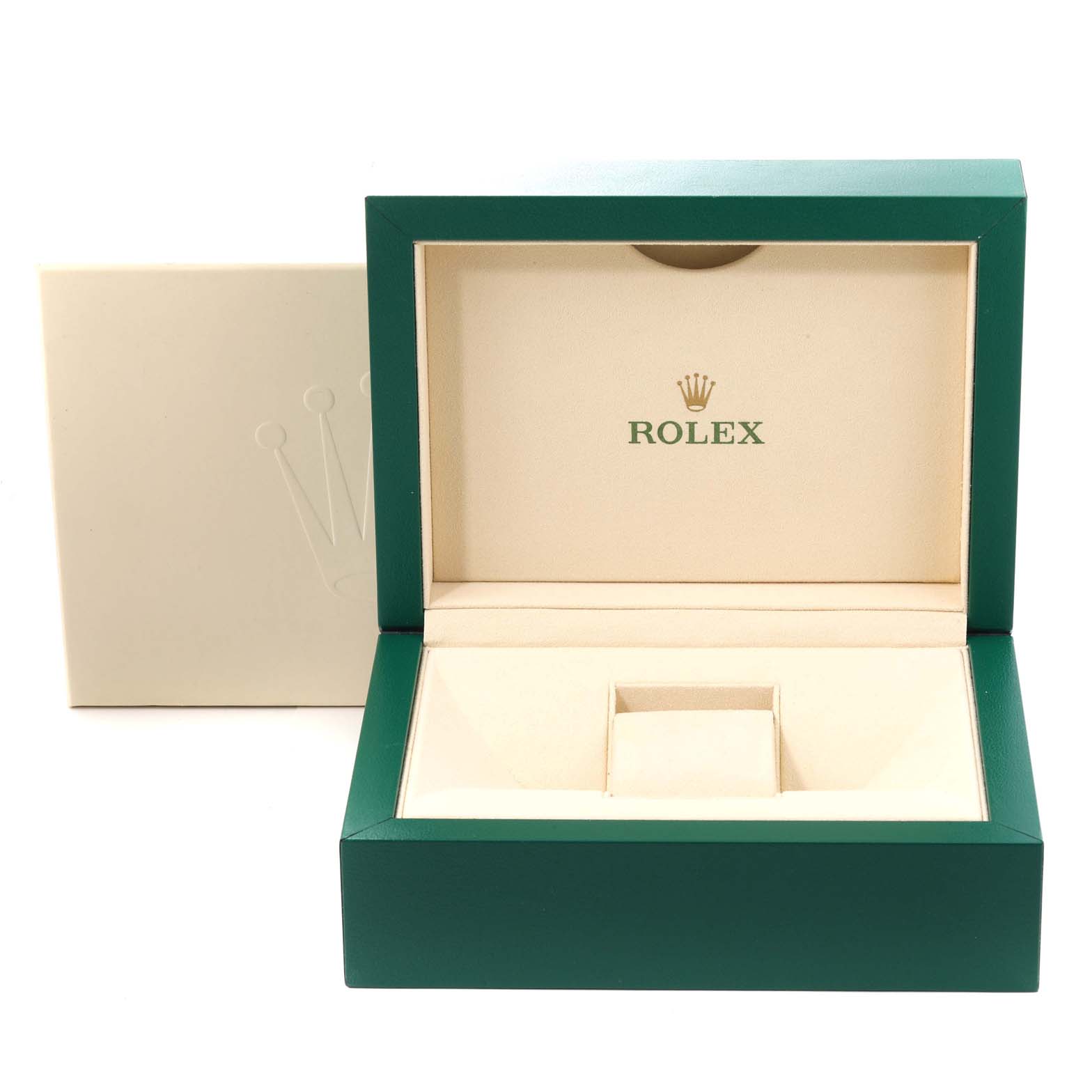 This image shows an open green and beige Rolex watch box, designed for a Daytona model by Rolex.