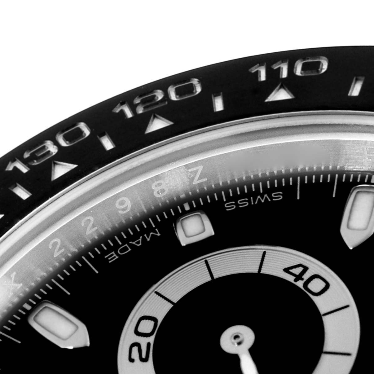 The close-up angle shows the bezel and part of the dial face of the Rolex Daytona 116500LN Men's Stainless Steel Black Dial 116500LN Men's Stainless Steel Black Dial watch.