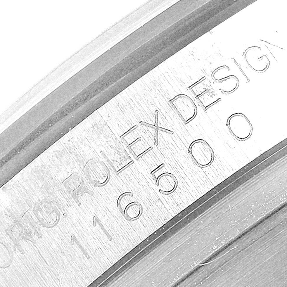 This close-up image shows part of the case serial and model number engraving of a Rolex Daytona 116500 Men's Stainless Steel Black Dial 116500 Men's Stainless Steel Black Dial watch.
